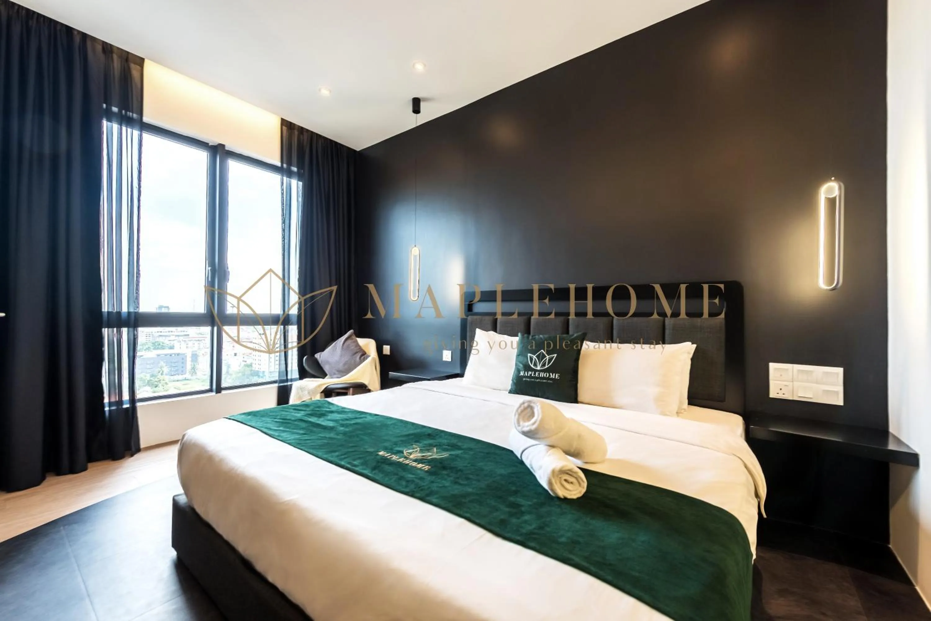 Bed in The Apple Premier Suites Melaka