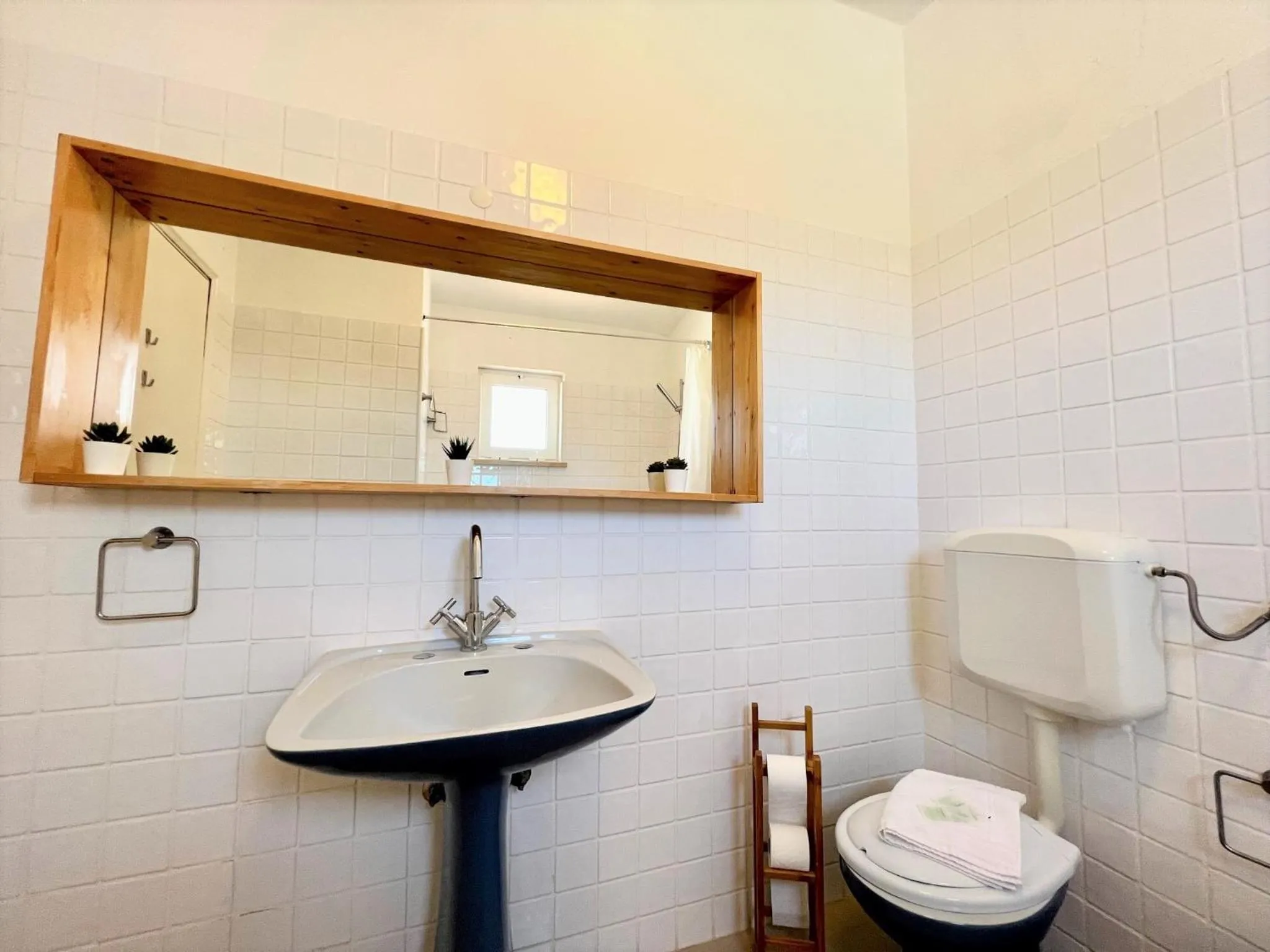 Bathroom in Armação de Pêra Twins 1 by Homing