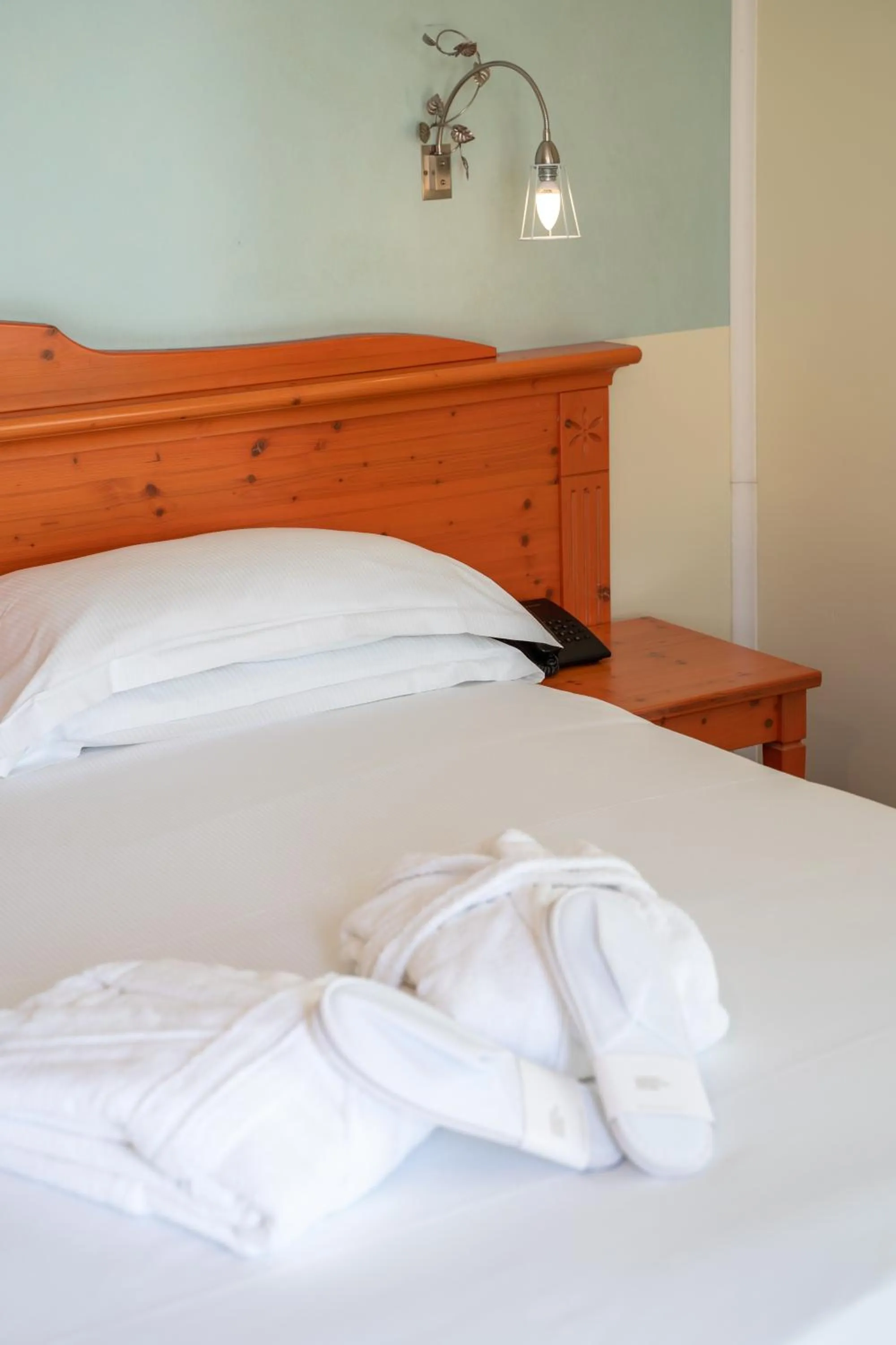 Bed in Hotel Residence Montelago