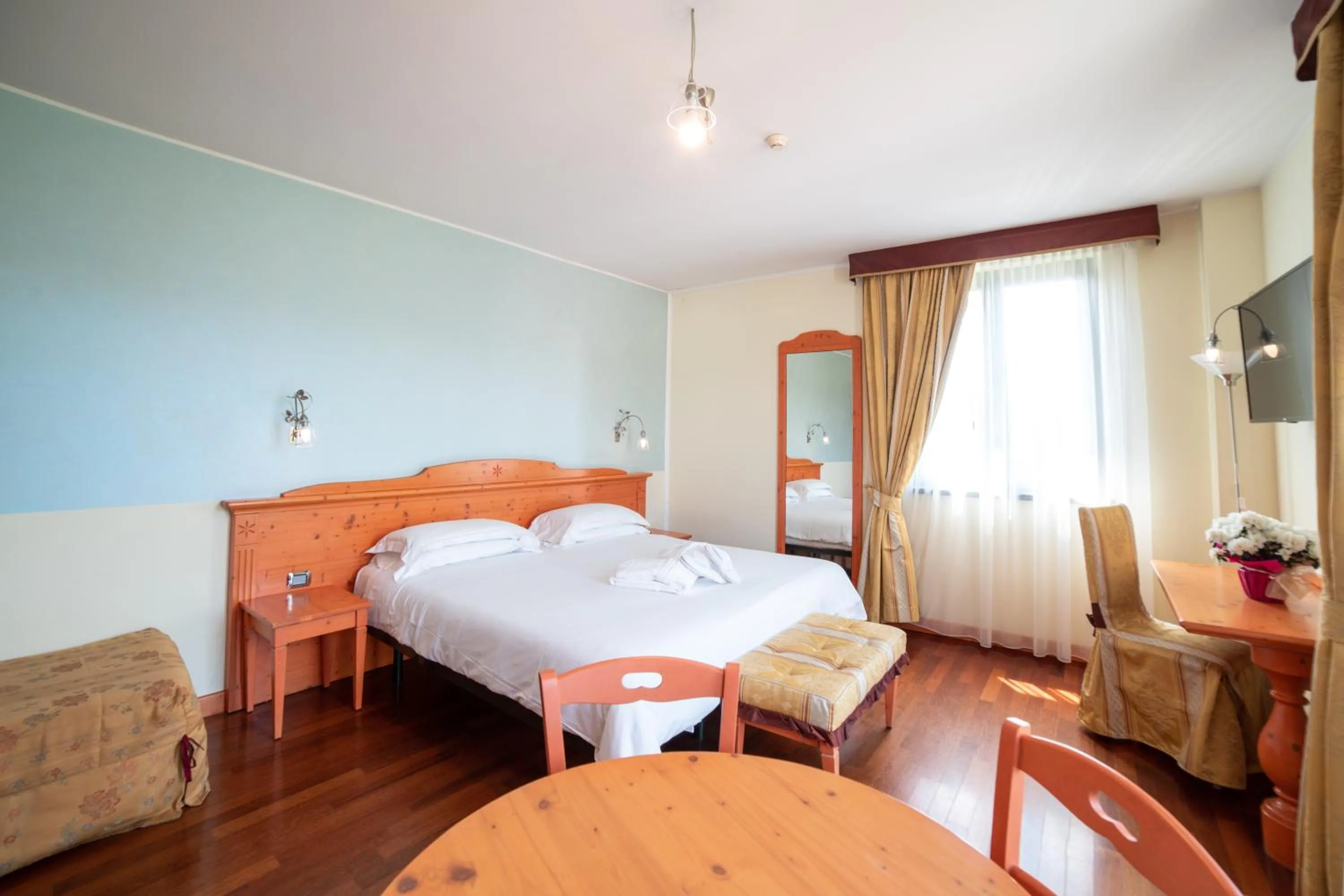 Bed in Hotel Residence Montelago