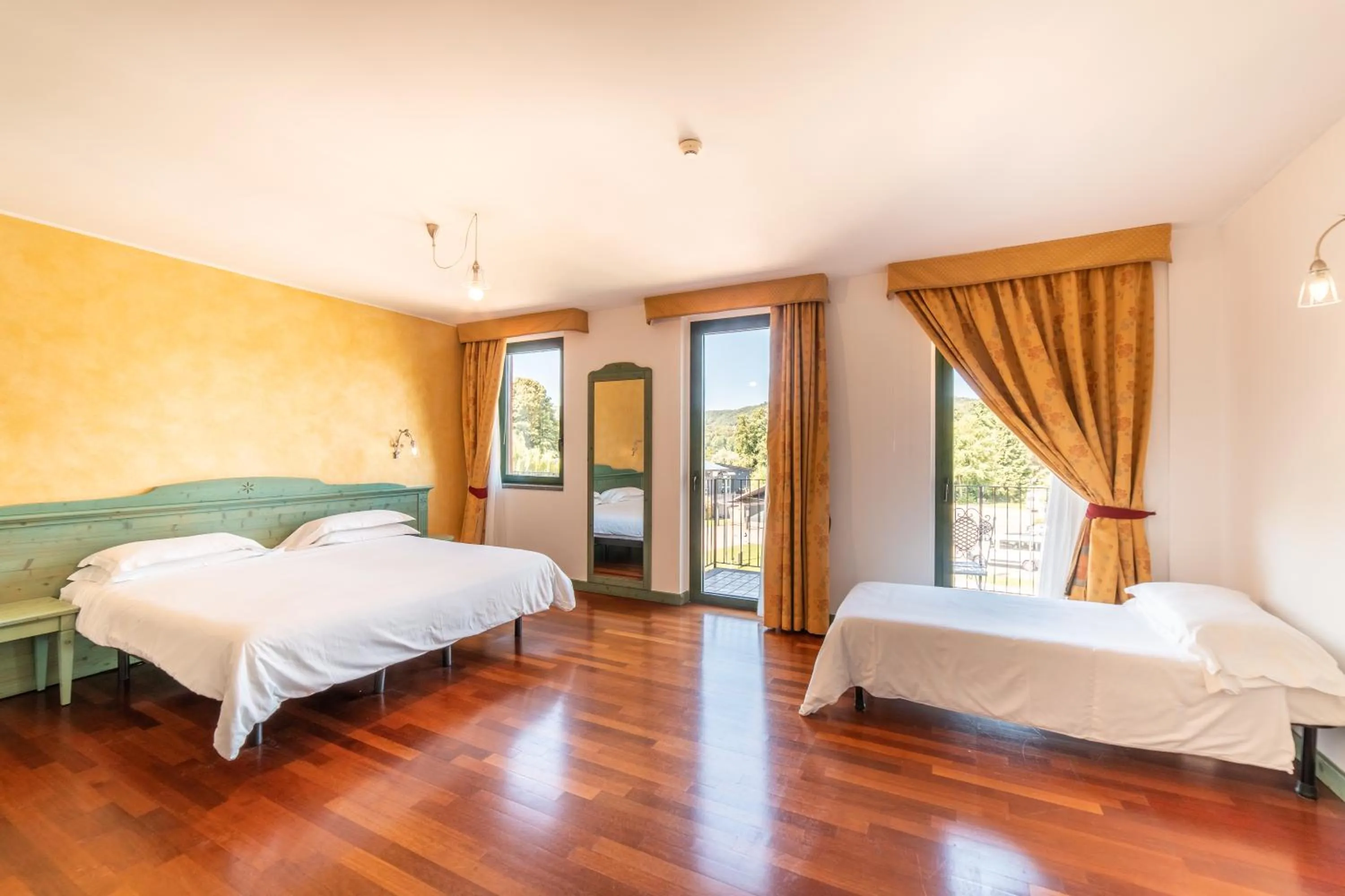 Bed in Hotel Residence Montelago