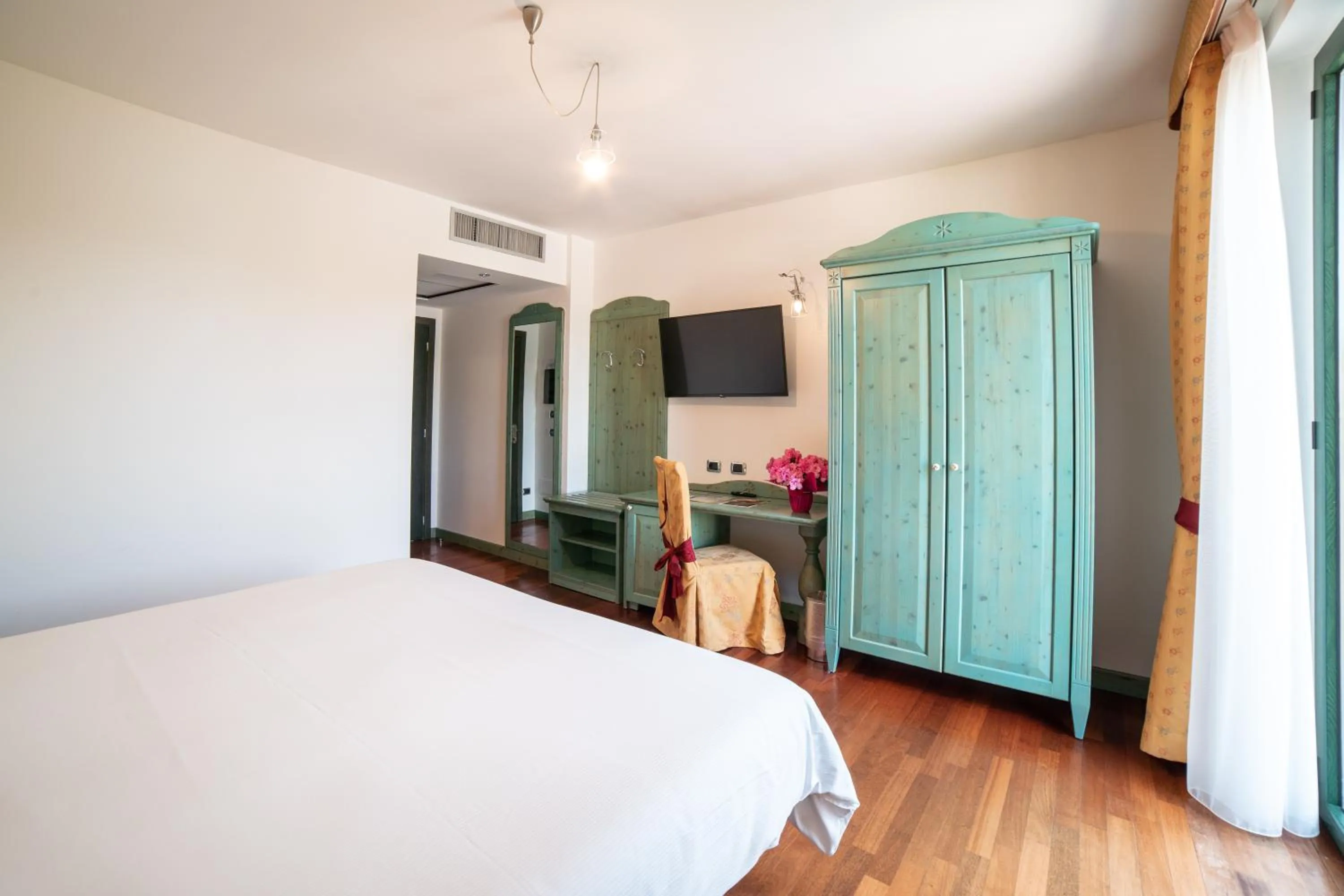 Bed in Hotel Residence Montelago