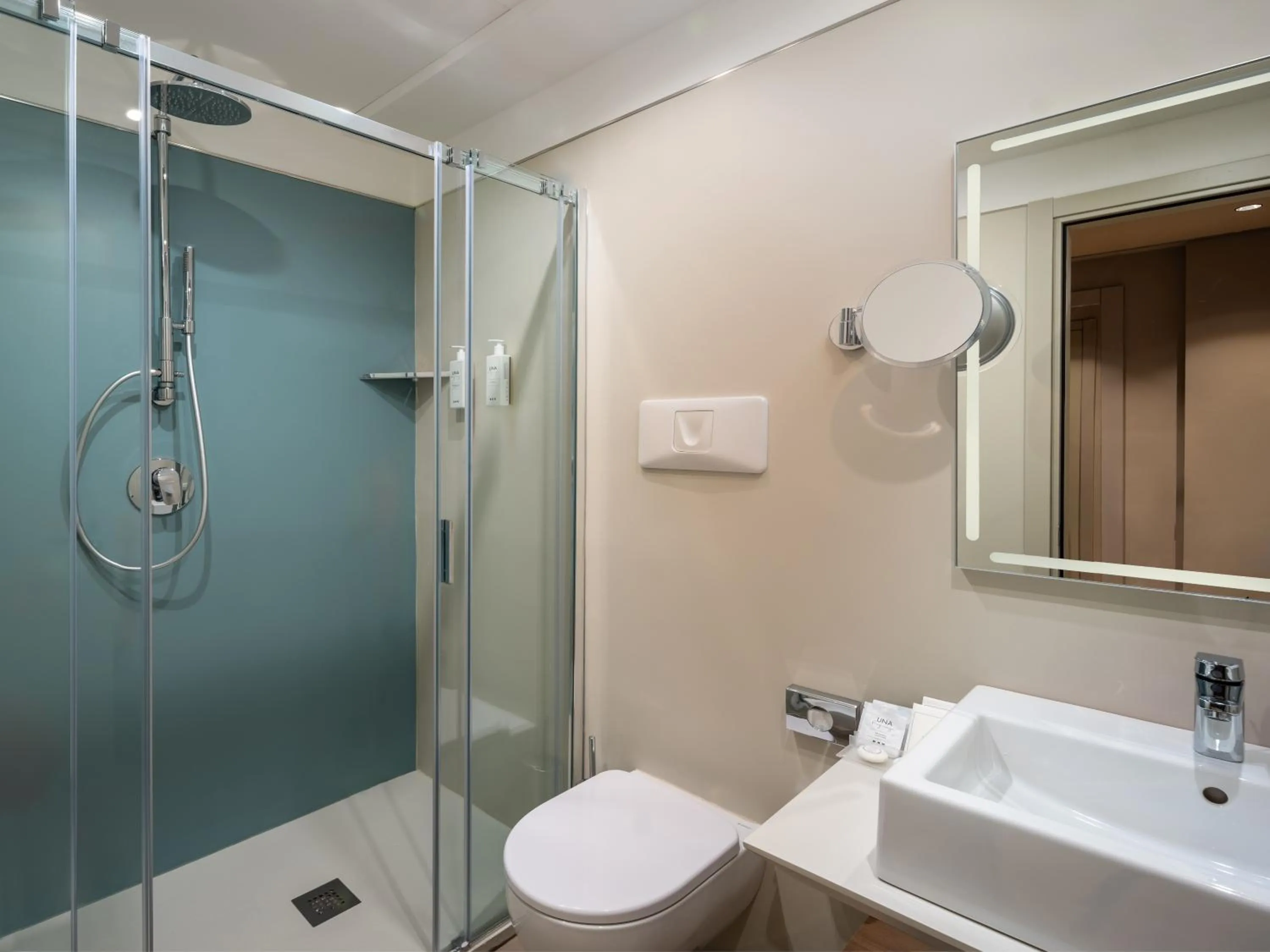 Bathroom in UNA Hotels Naxos Beach Sicilia