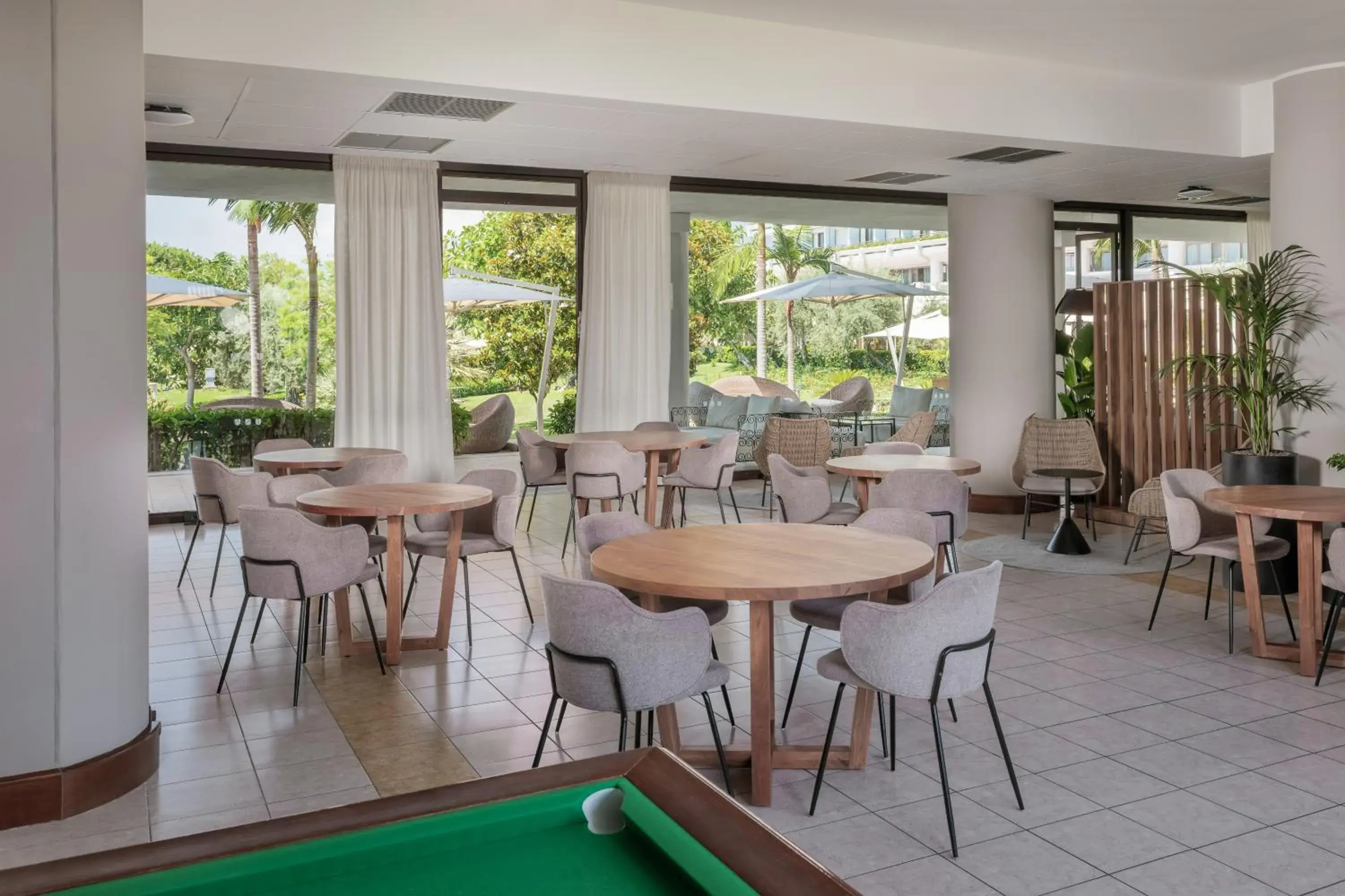 Lounge or bar in UNA Hotels Naxos Beach Sicilia Lounge or bar in UNA Hotels Naxos Beach Sicilia