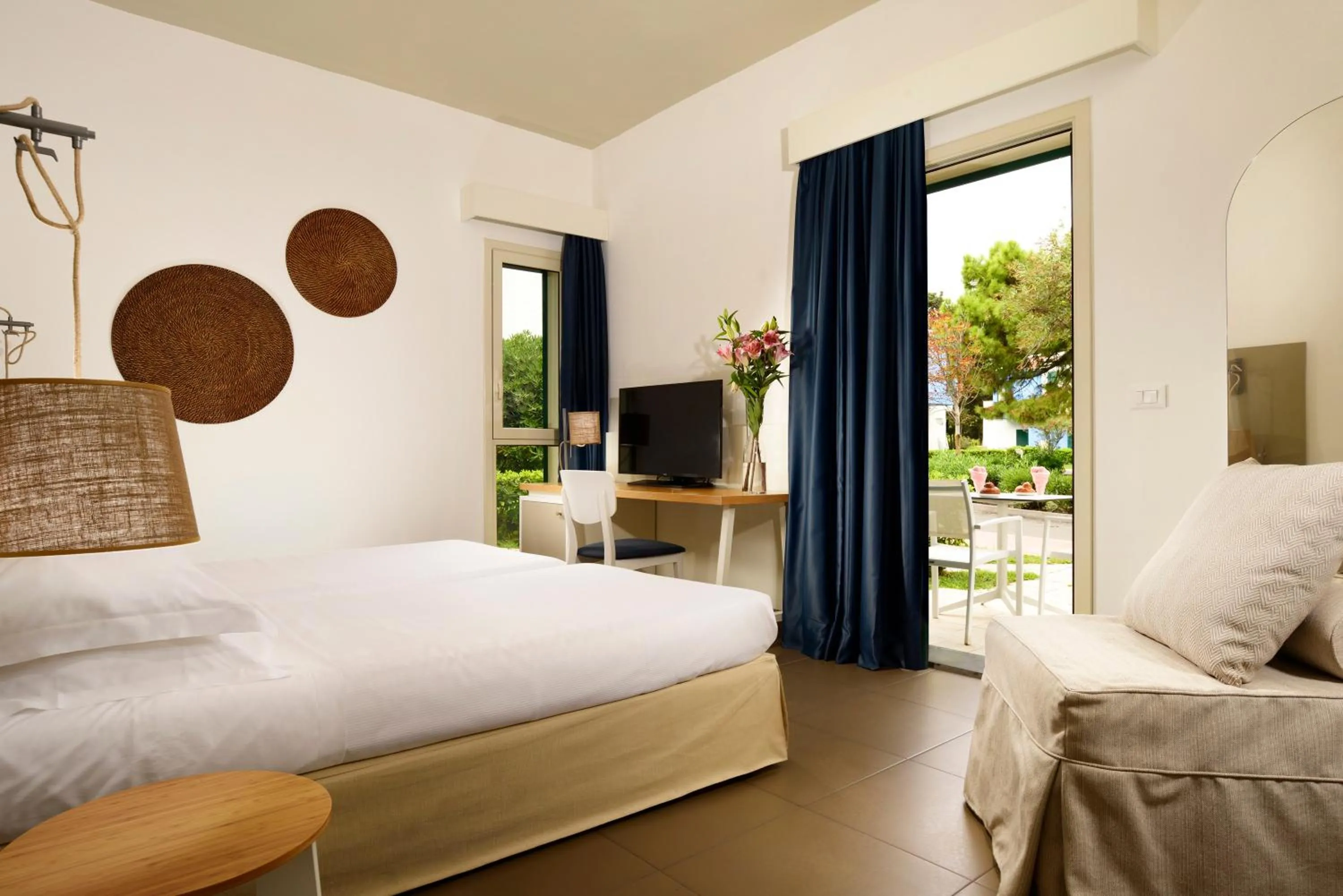 Bed in UNA Hotels Naxos Beach Sicilia