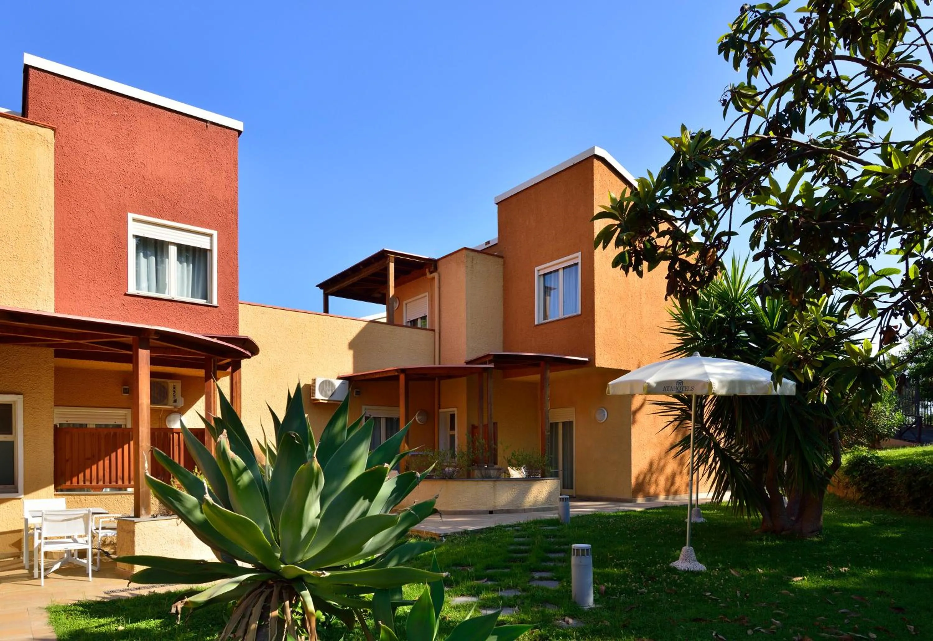 Garden in UNA Hotels Naxos Beach Sicilia