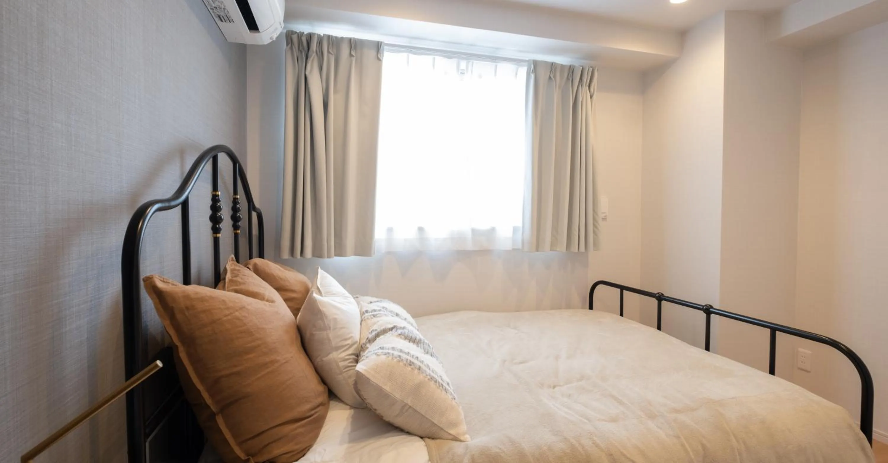 Bed in Ken's Place麻布East