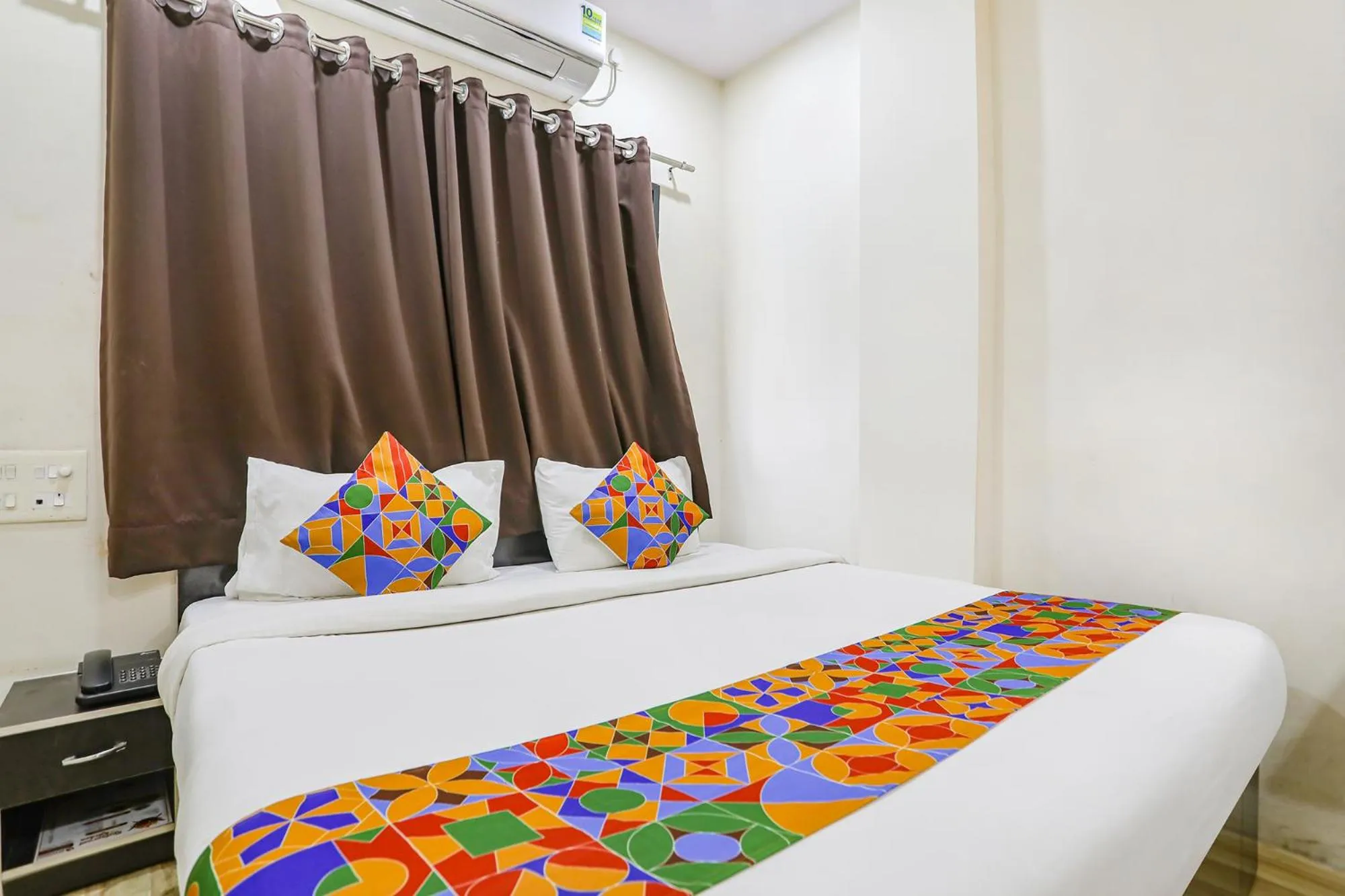 Bed in FabHotel New Shraddha Inn - Nr Airport Colony