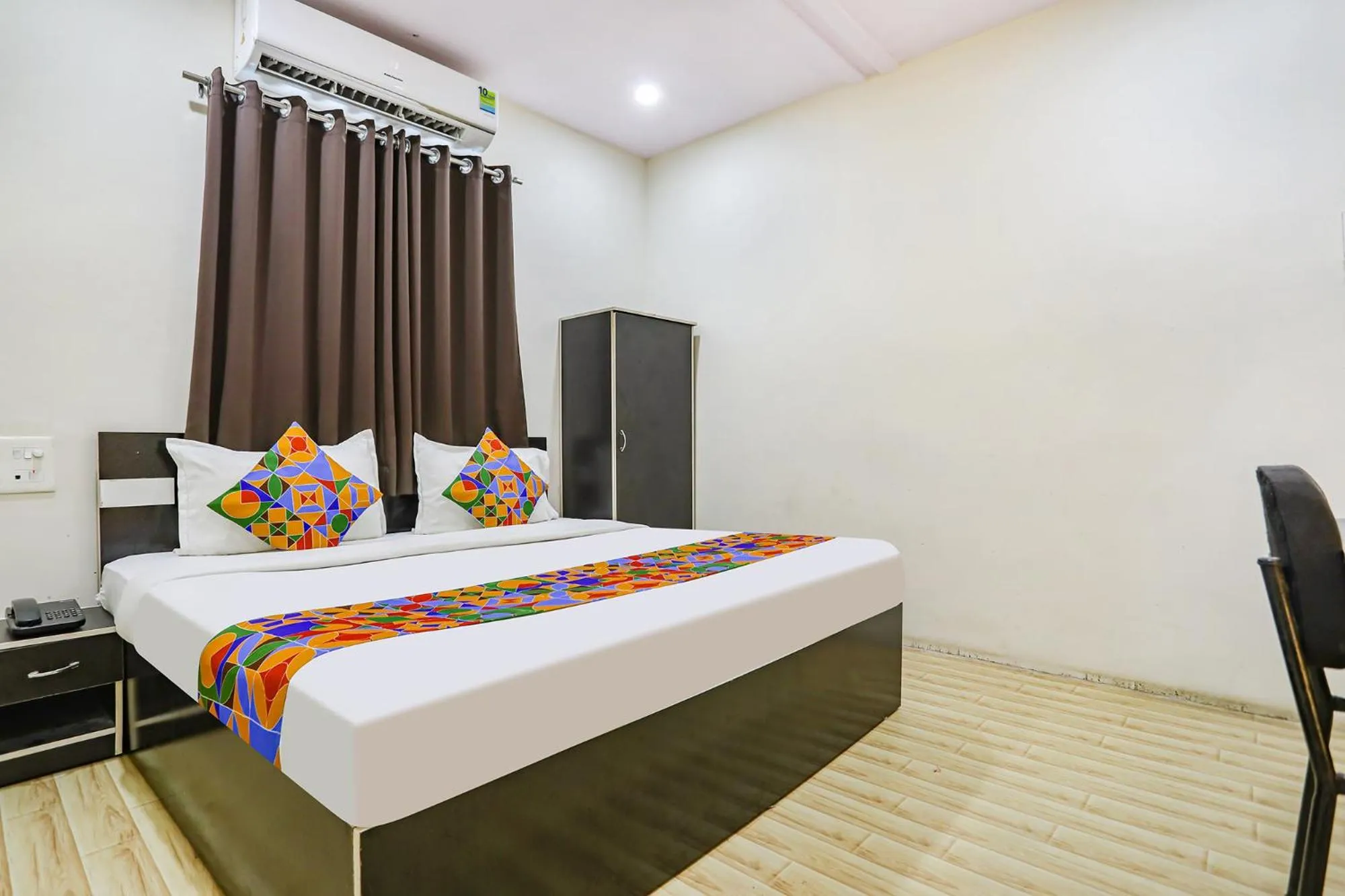 Bed in FabHotel New Shraddha Inn - Nr Airport Colony