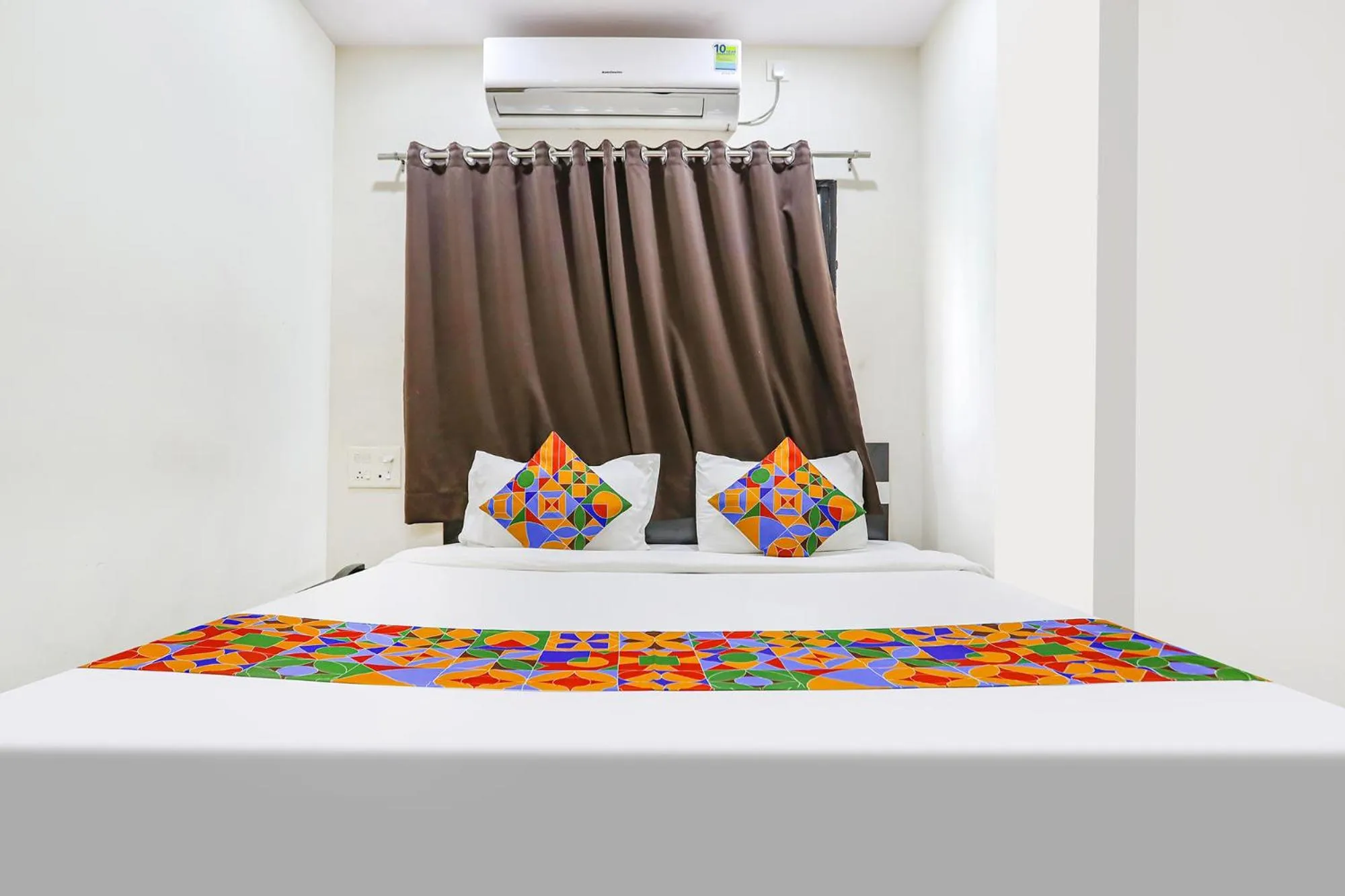 Bed in FabHotel New Shraddha Inn - Nr Airport Colony