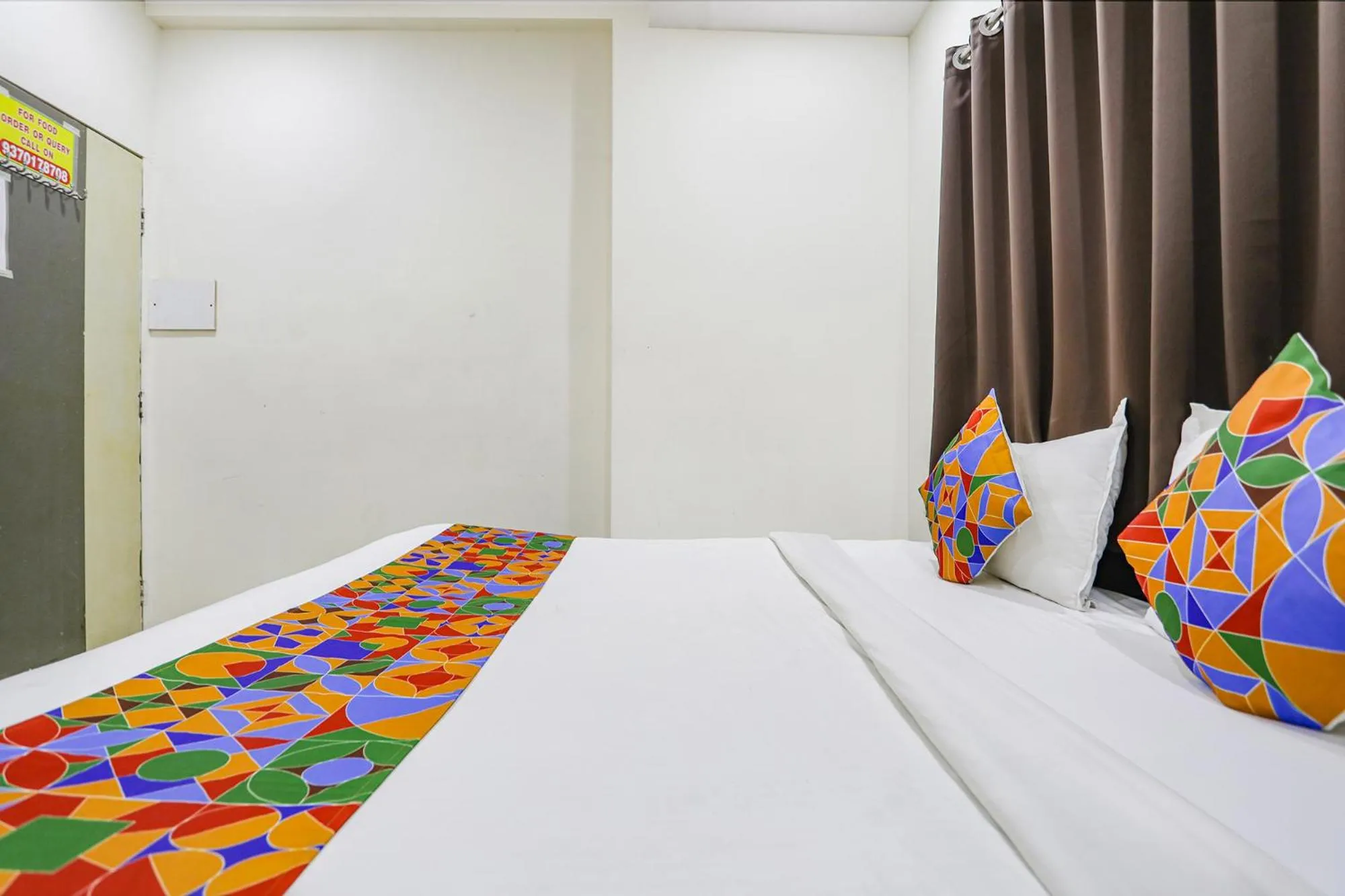 Bed in FabHotel New Shraddha Inn - Nr Airport Colony