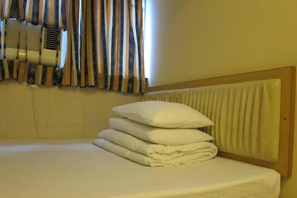 Bed in Wai fan Guest house