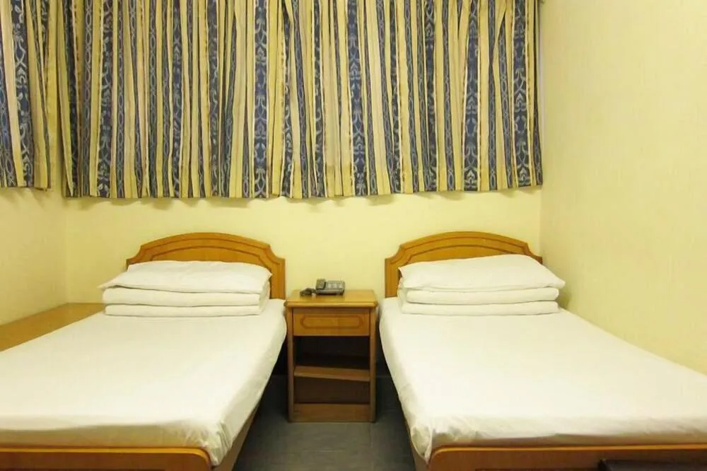 Bed in Wai fan Guest house