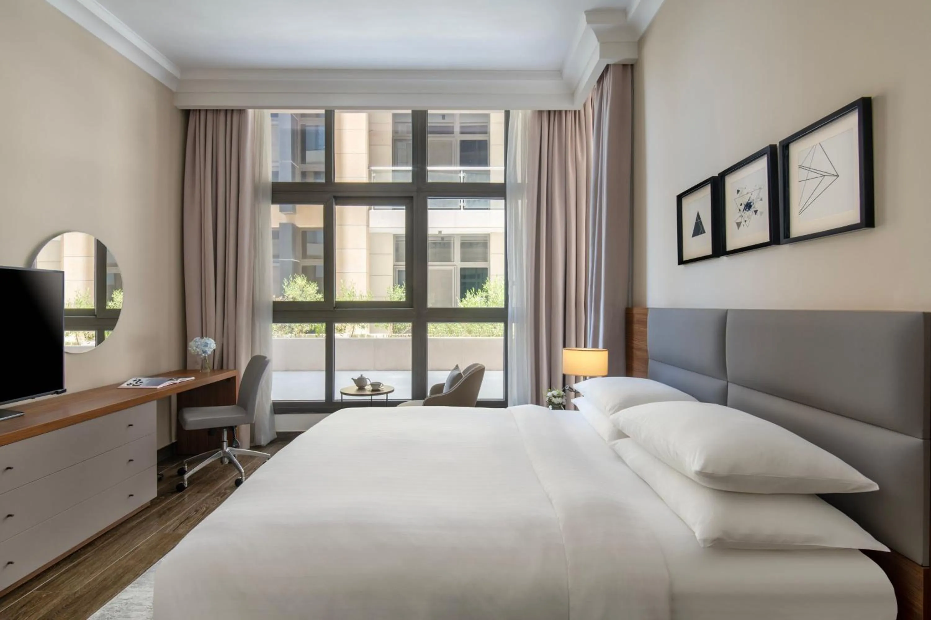 Photo of the whole room, Bed in Marriott Executive Apartments Doha, Le Mirage City Walk