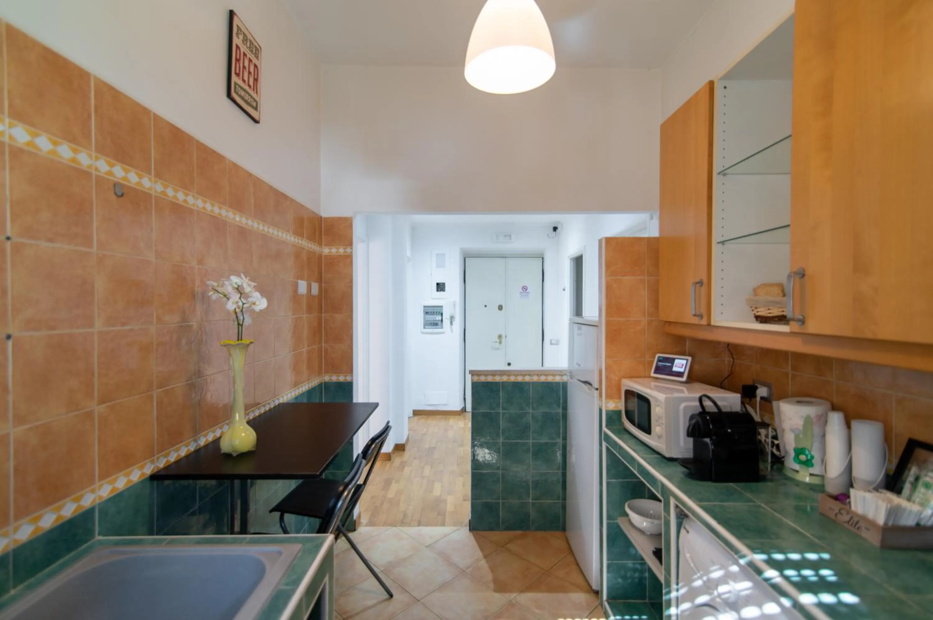 Communal kitchen in Exa Rooms - Prati