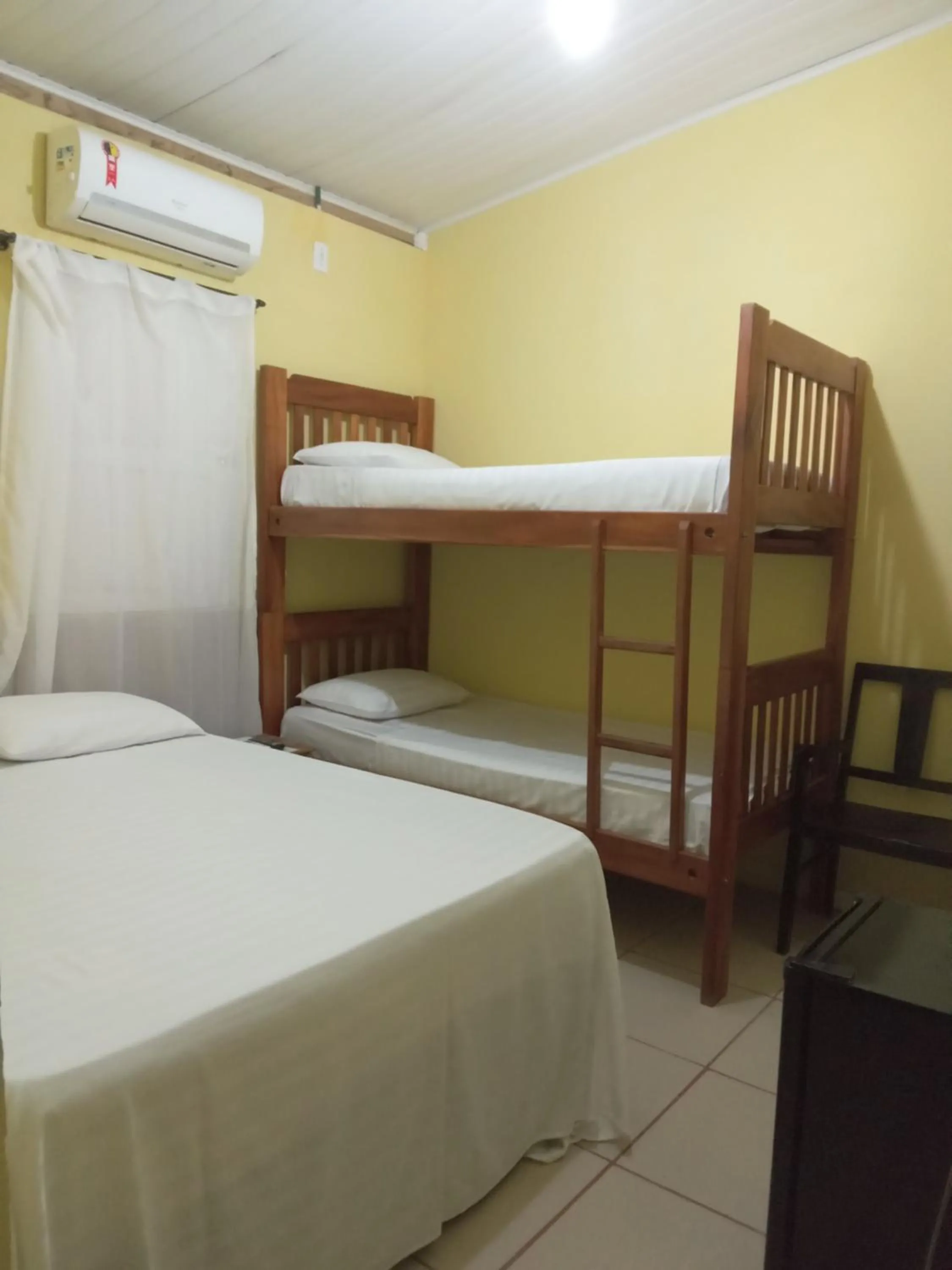 Bed in Pousada Villas Colossos