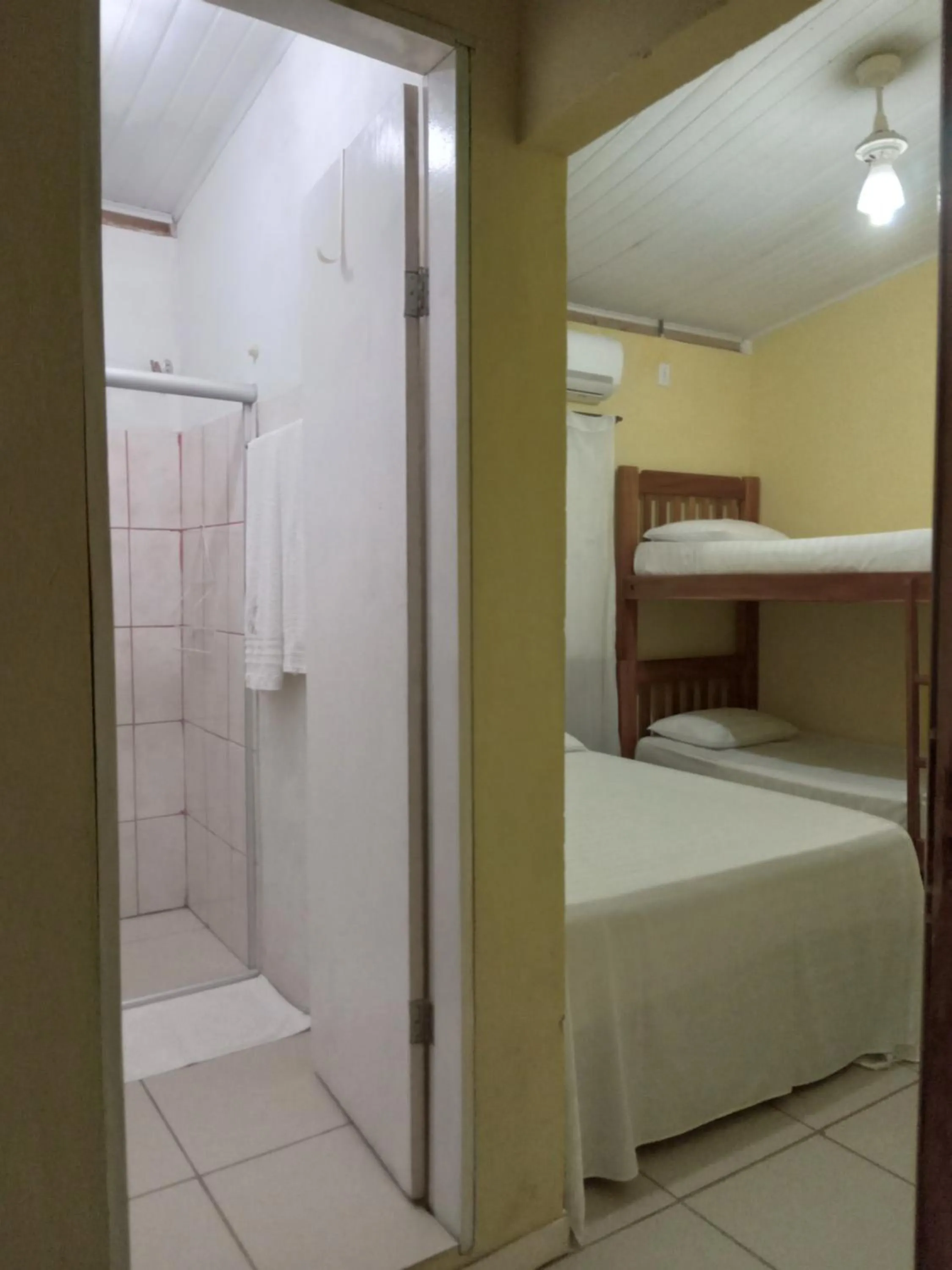 Bed in Pousada Villas Colossos