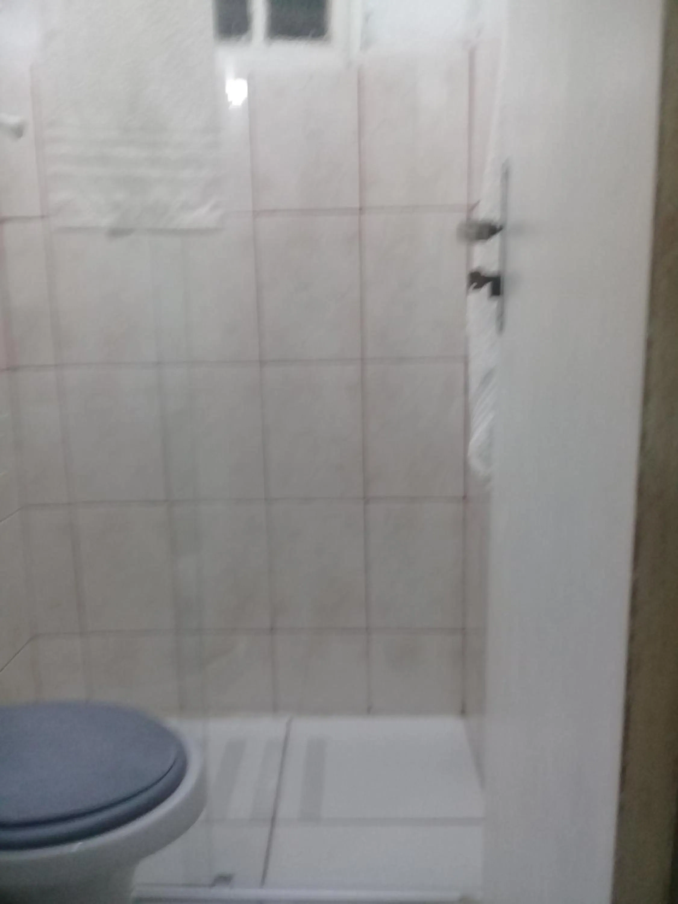 Toilet in Pousada Villas Colossos