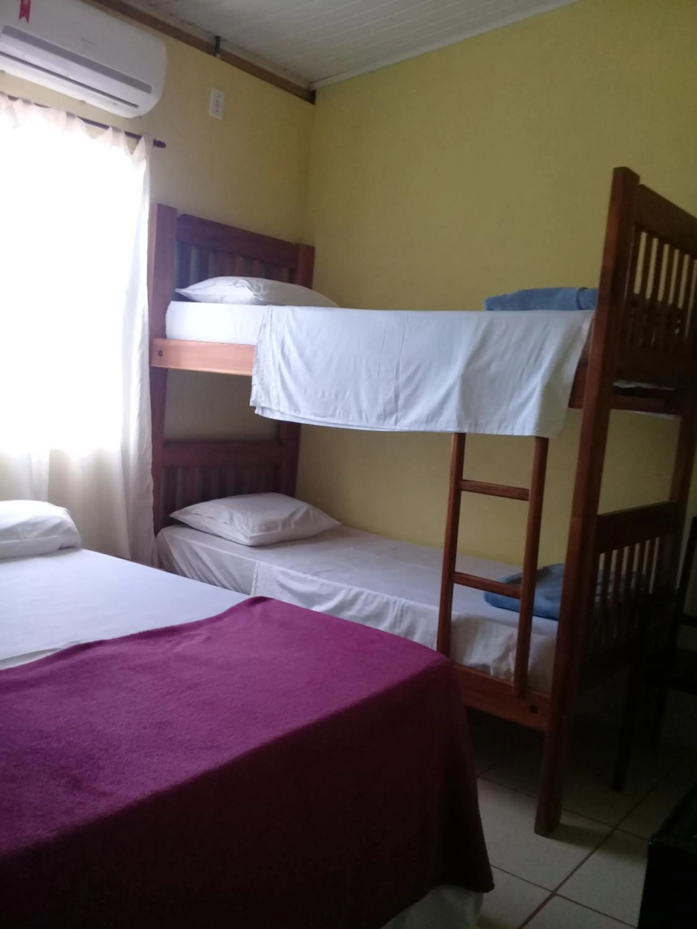 Bed in Pousada Villas Colossos