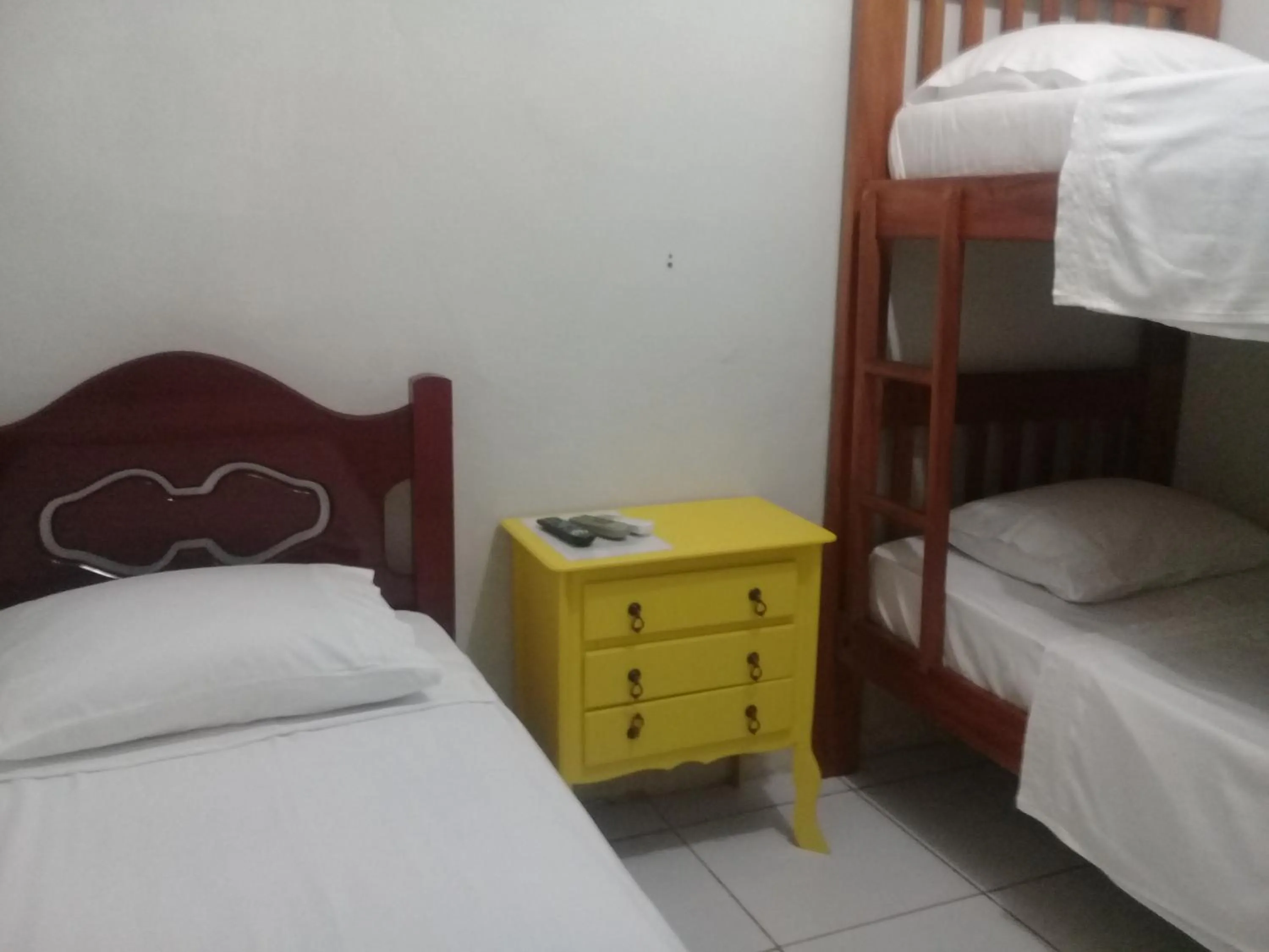 Bed in Pousada Villas Colossos