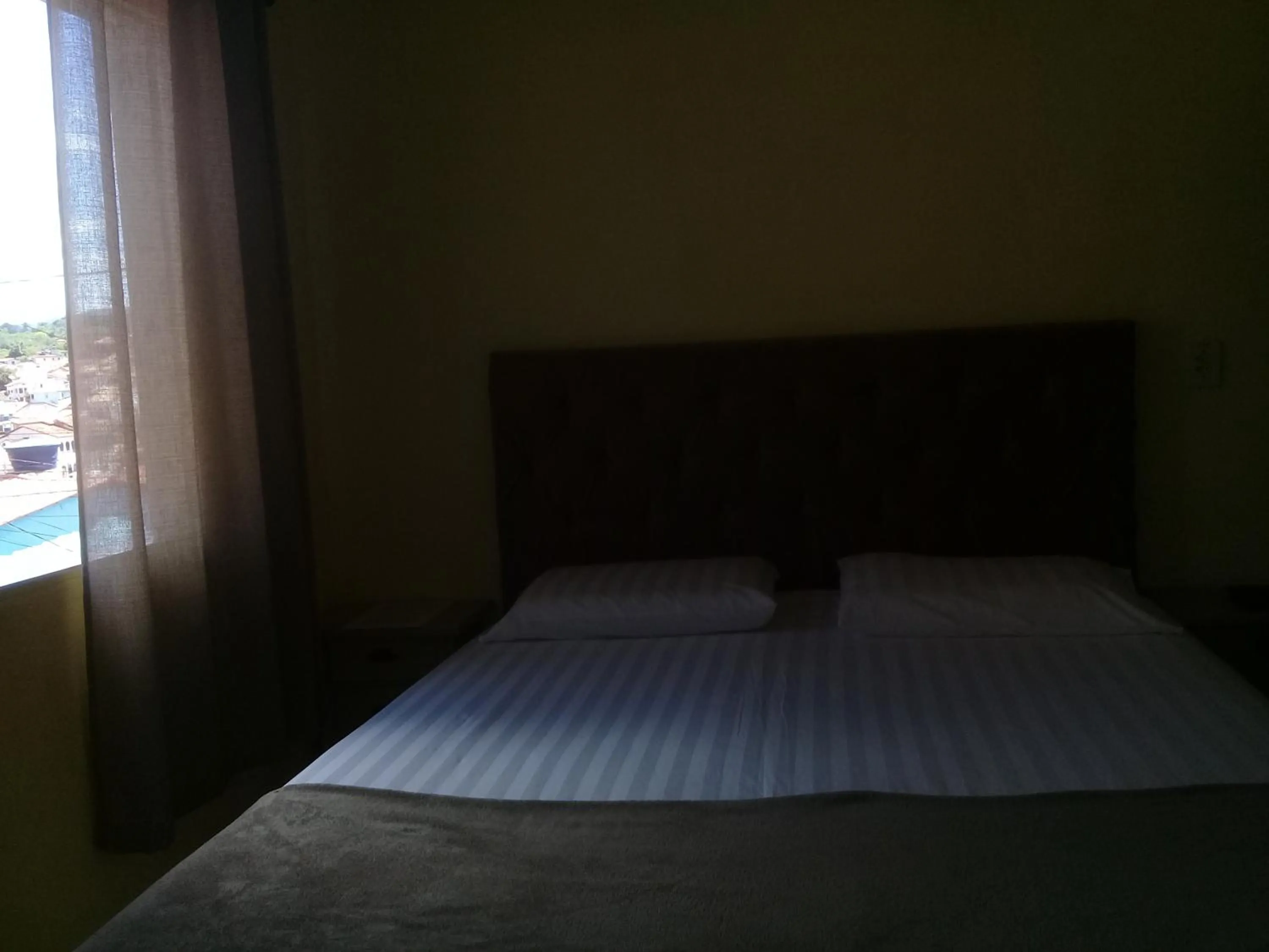 Bed in Pousada Villas Colossos