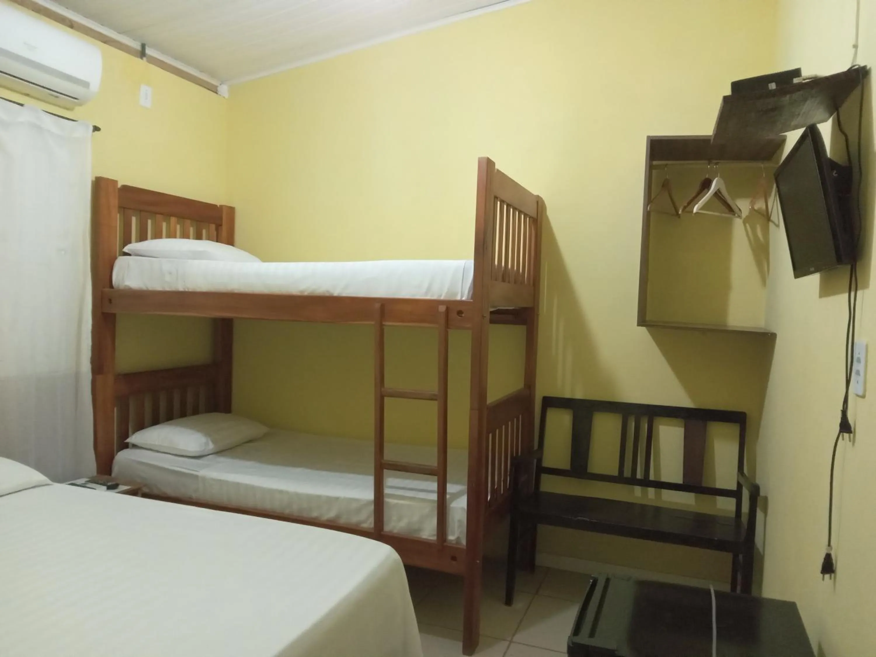 Bed in Pousada Villas Colossos