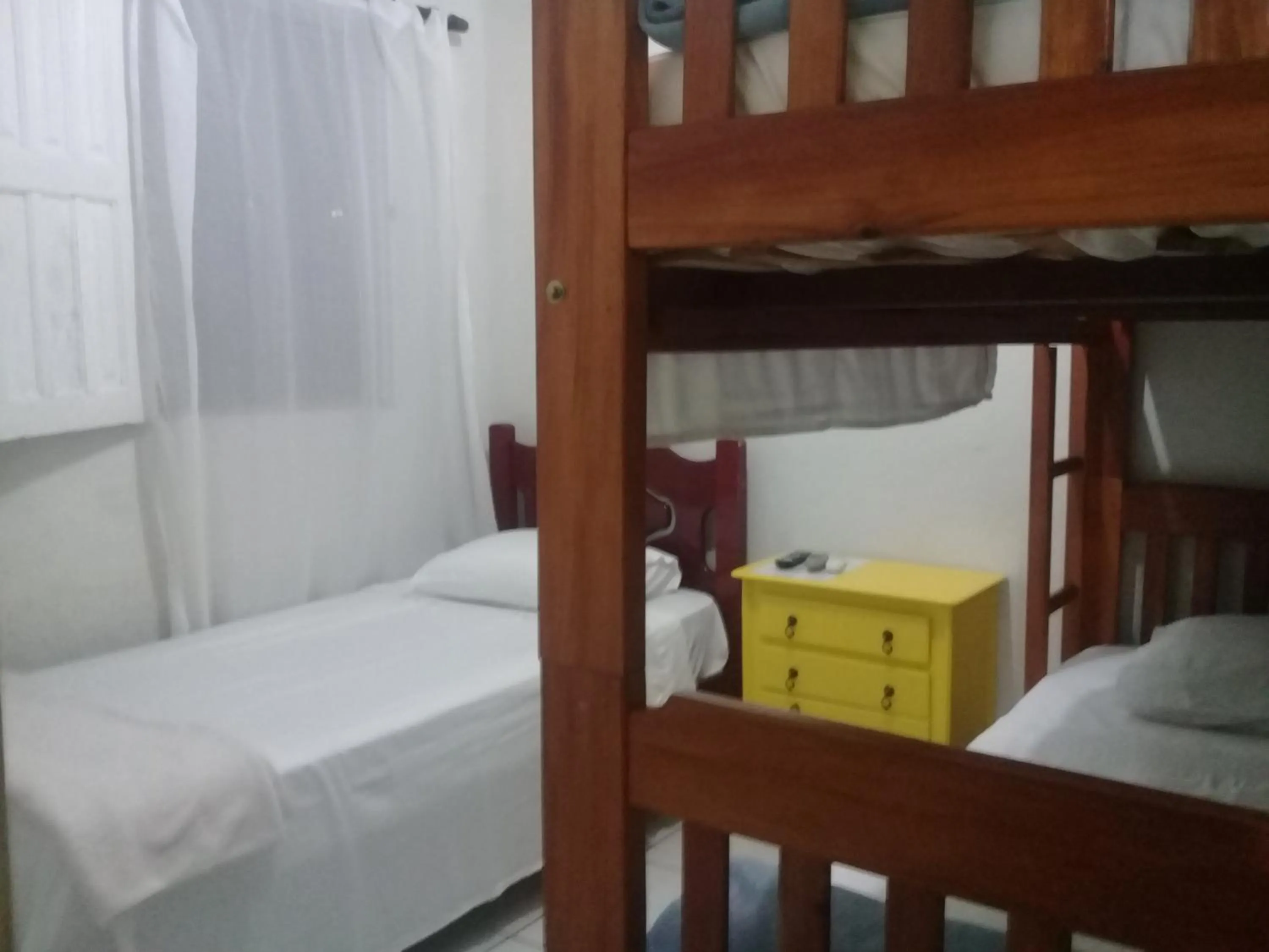 Bed in Pousada Villas Colossos