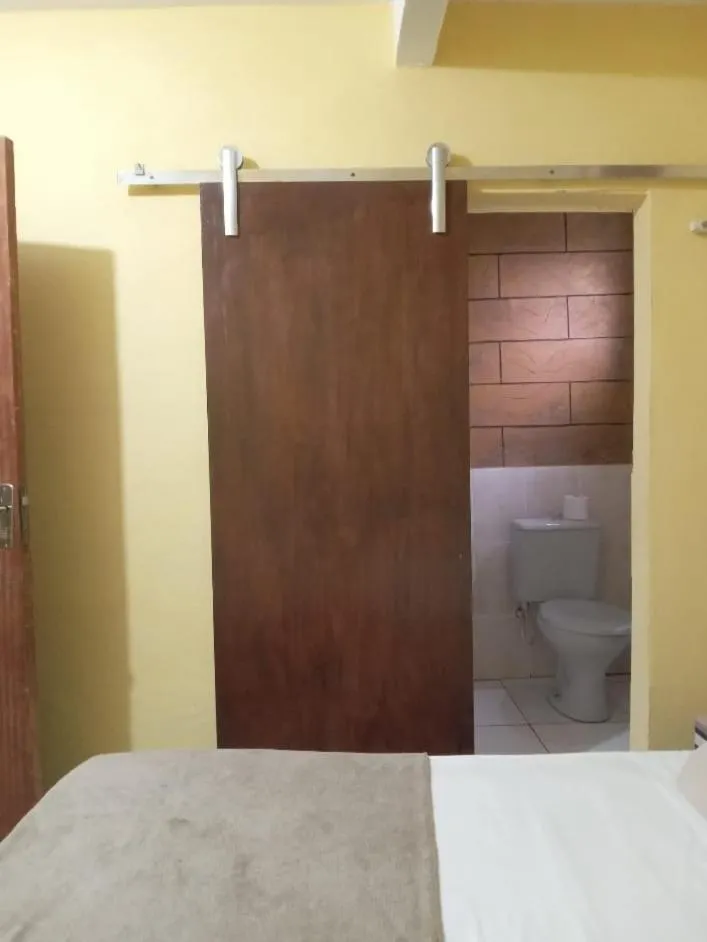 Toilet in Pousada Villas Colossos