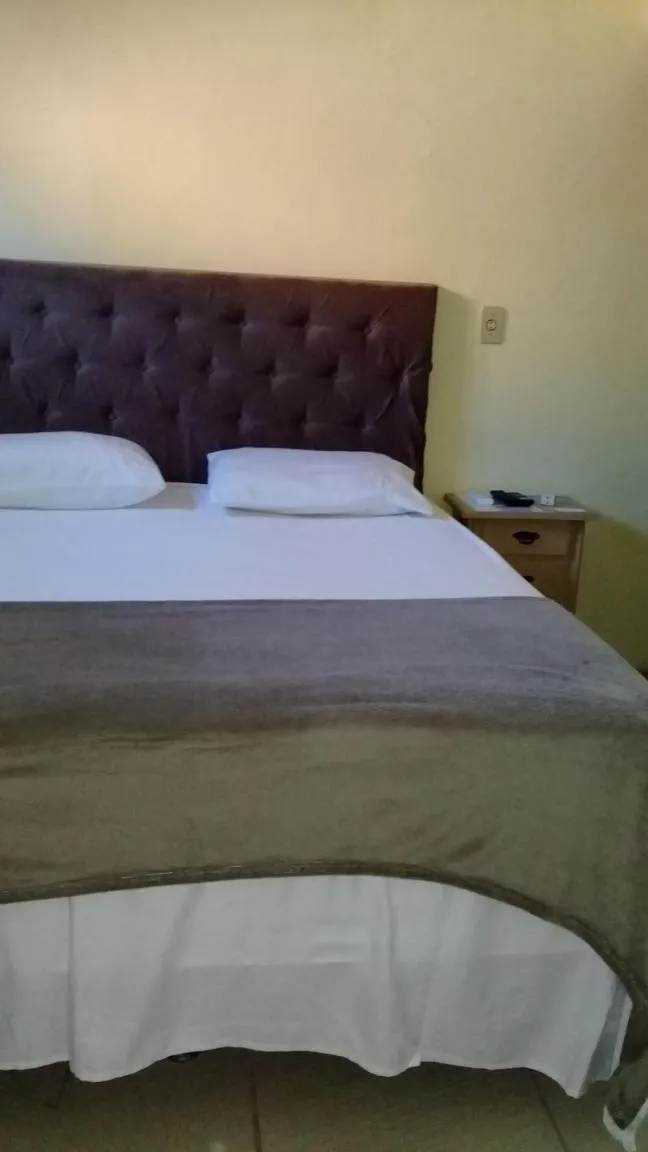 Photo of the whole room, Bed in Pousada Villas Colossos