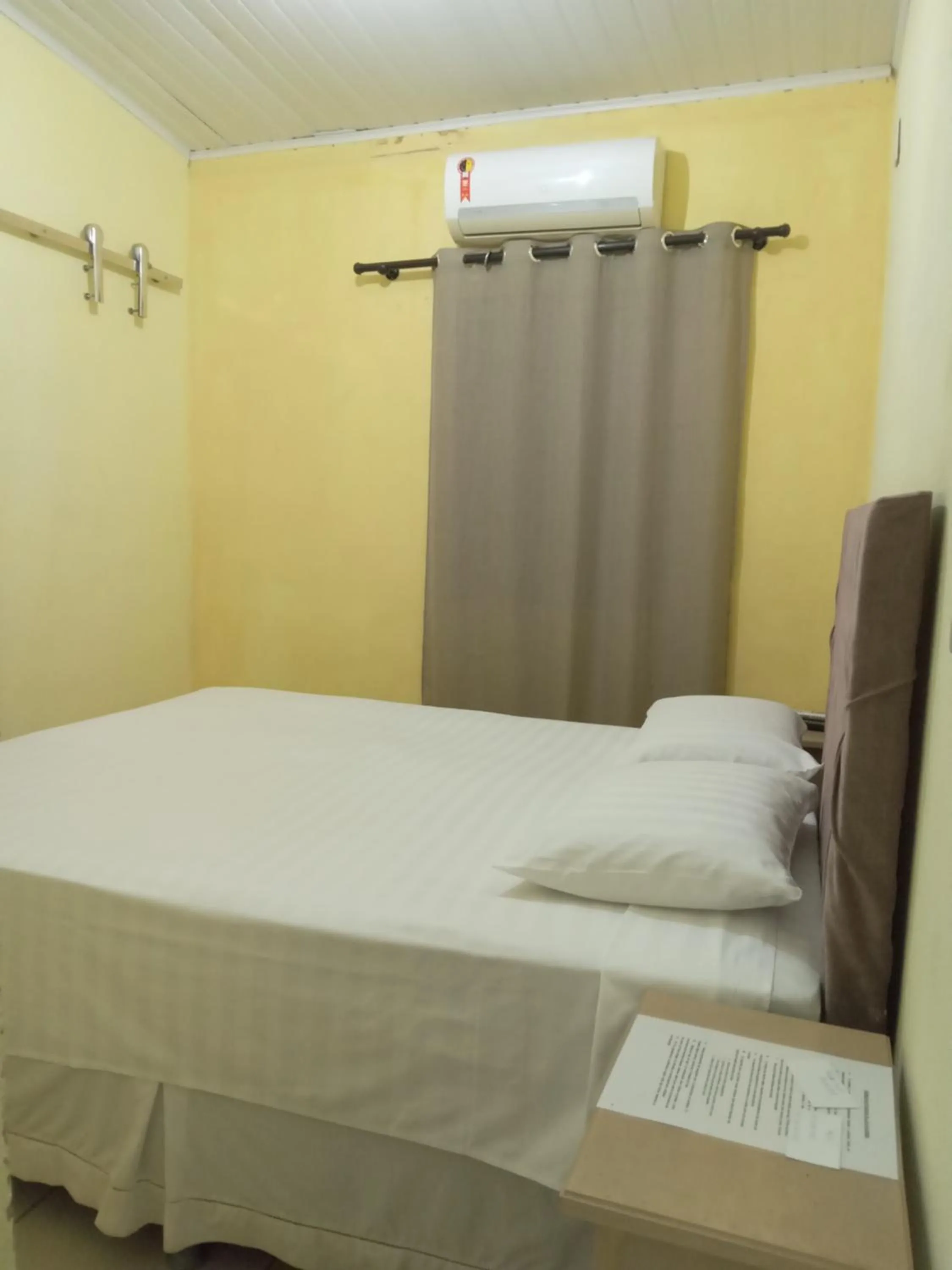 Bed in Pousada Villas Colossos