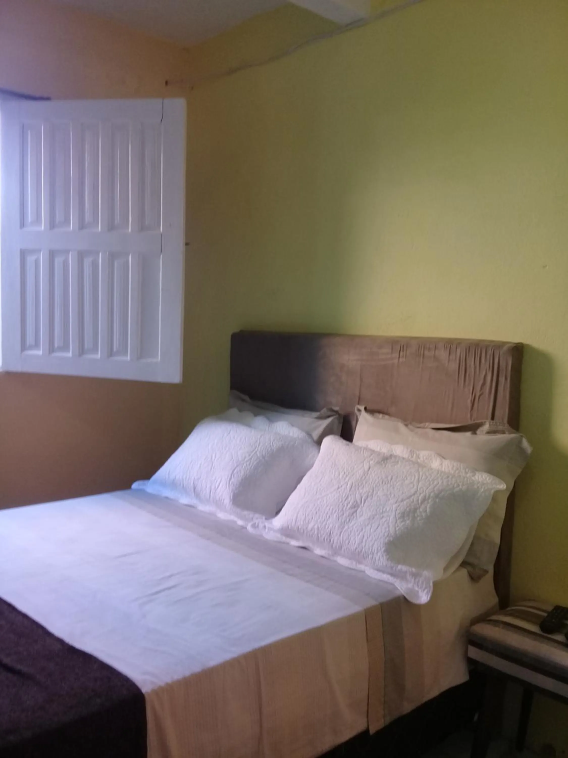 Bed in Pousada Villas Colossos