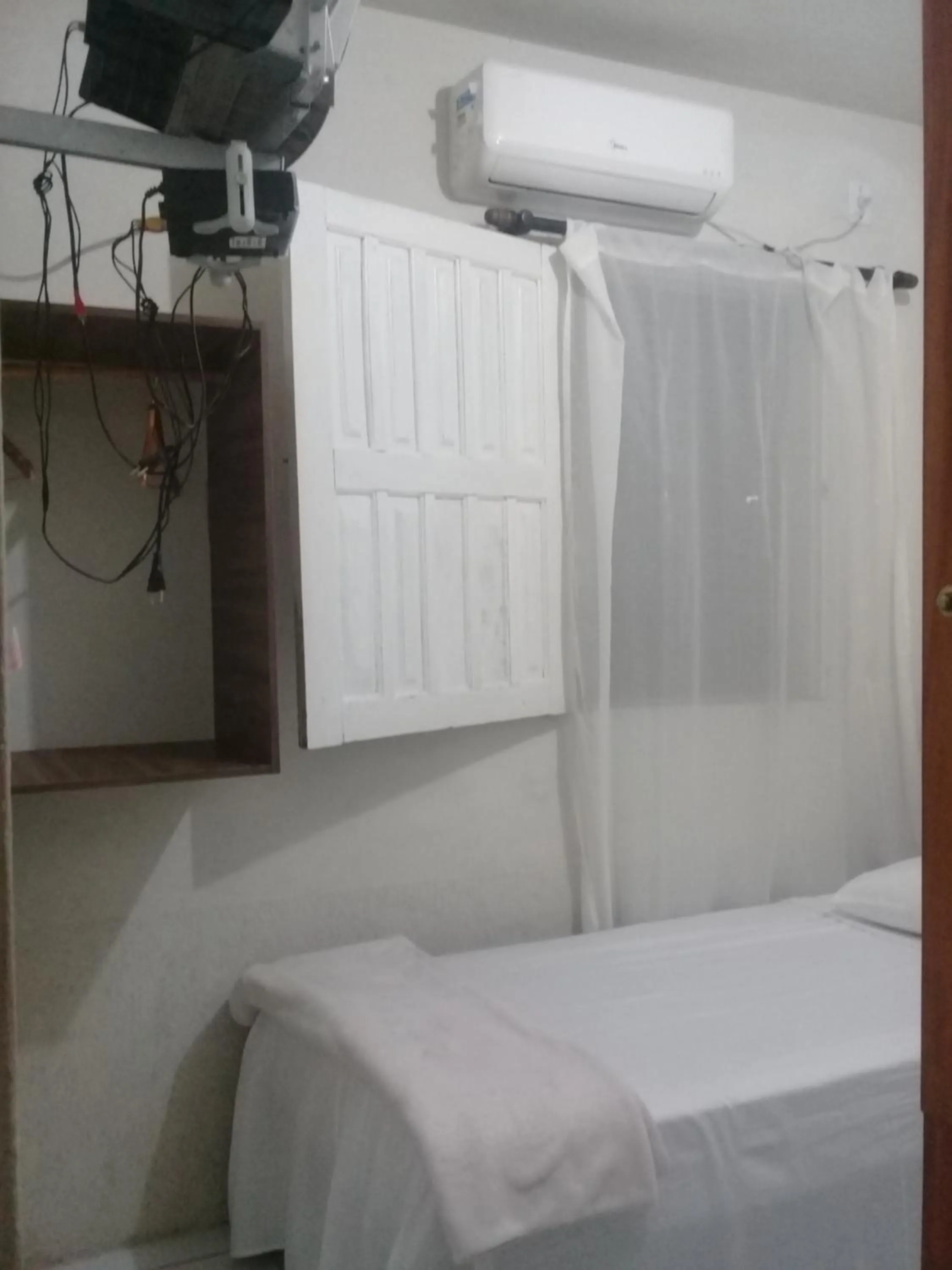 Bed in Pousada Villas Colossos