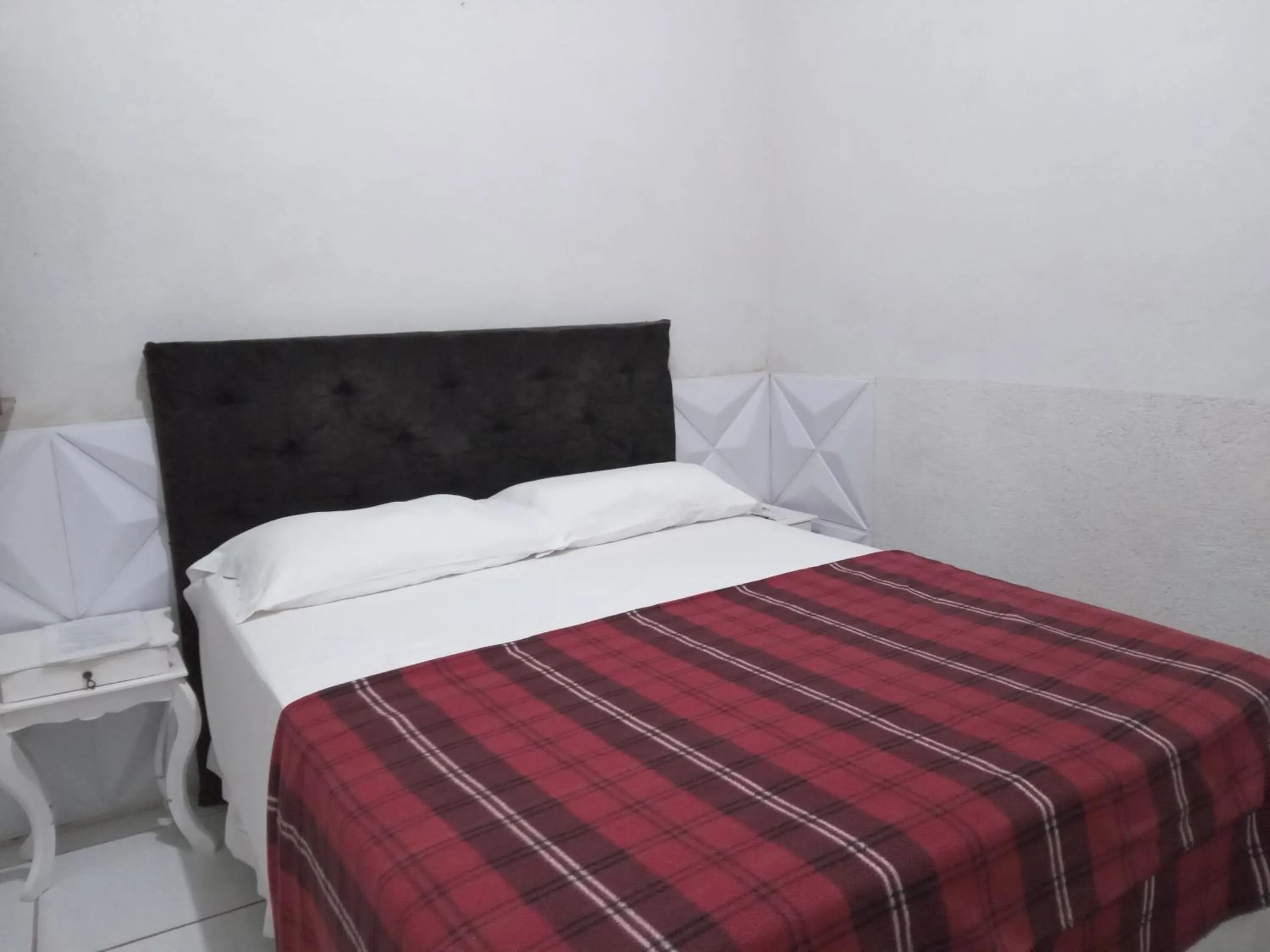 Bed in Pousada Villas Colossos
