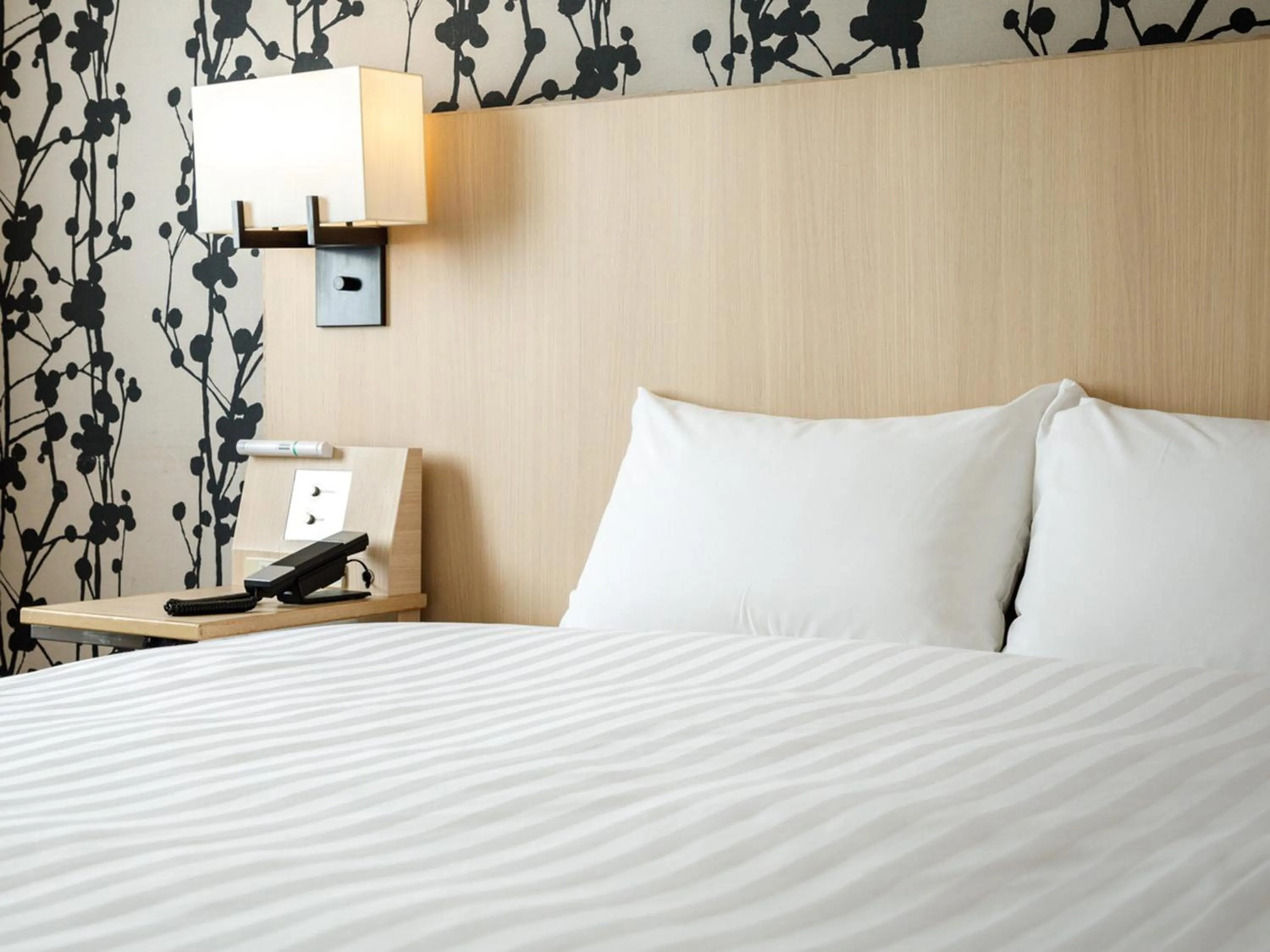 Photo of the whole room, Bed in Nishitetsu Resort Inn Beppu