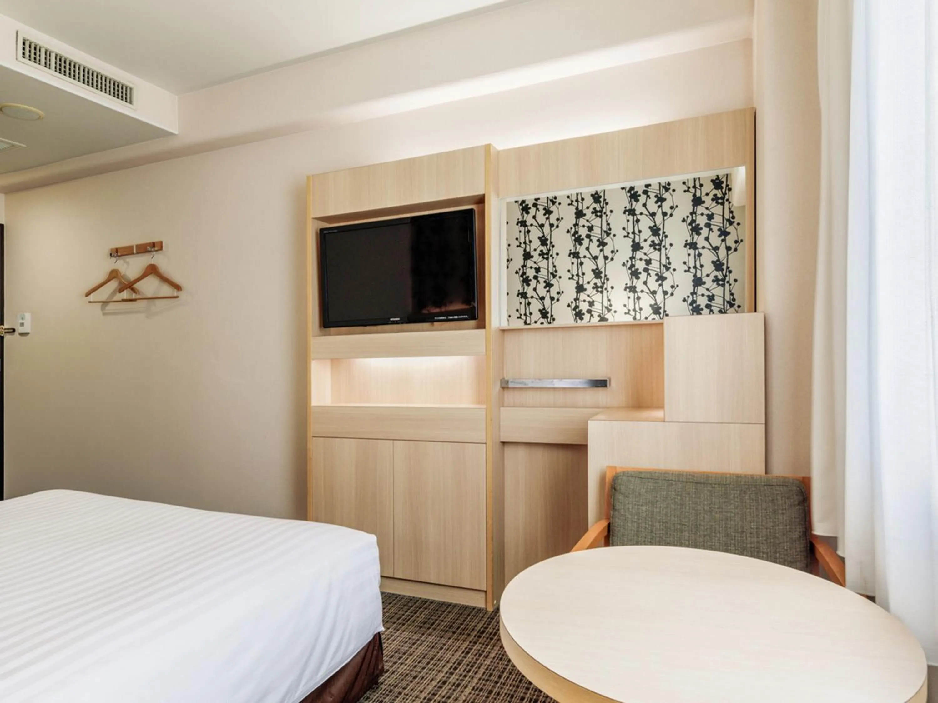 Photo of the whole room, Bed in Nishitetsu Resort Inn Beppu