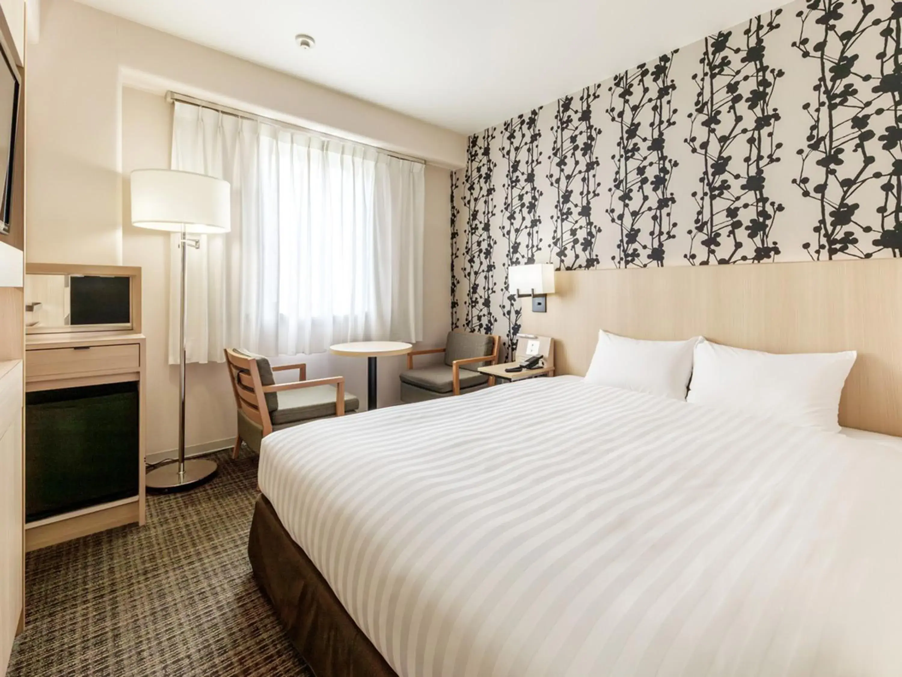 Photo of the whole room, Bed in Nishitetsu Resort Inn Beppu Photo of the whole room, Bed in Nishitetsu Resort Inn Beppu