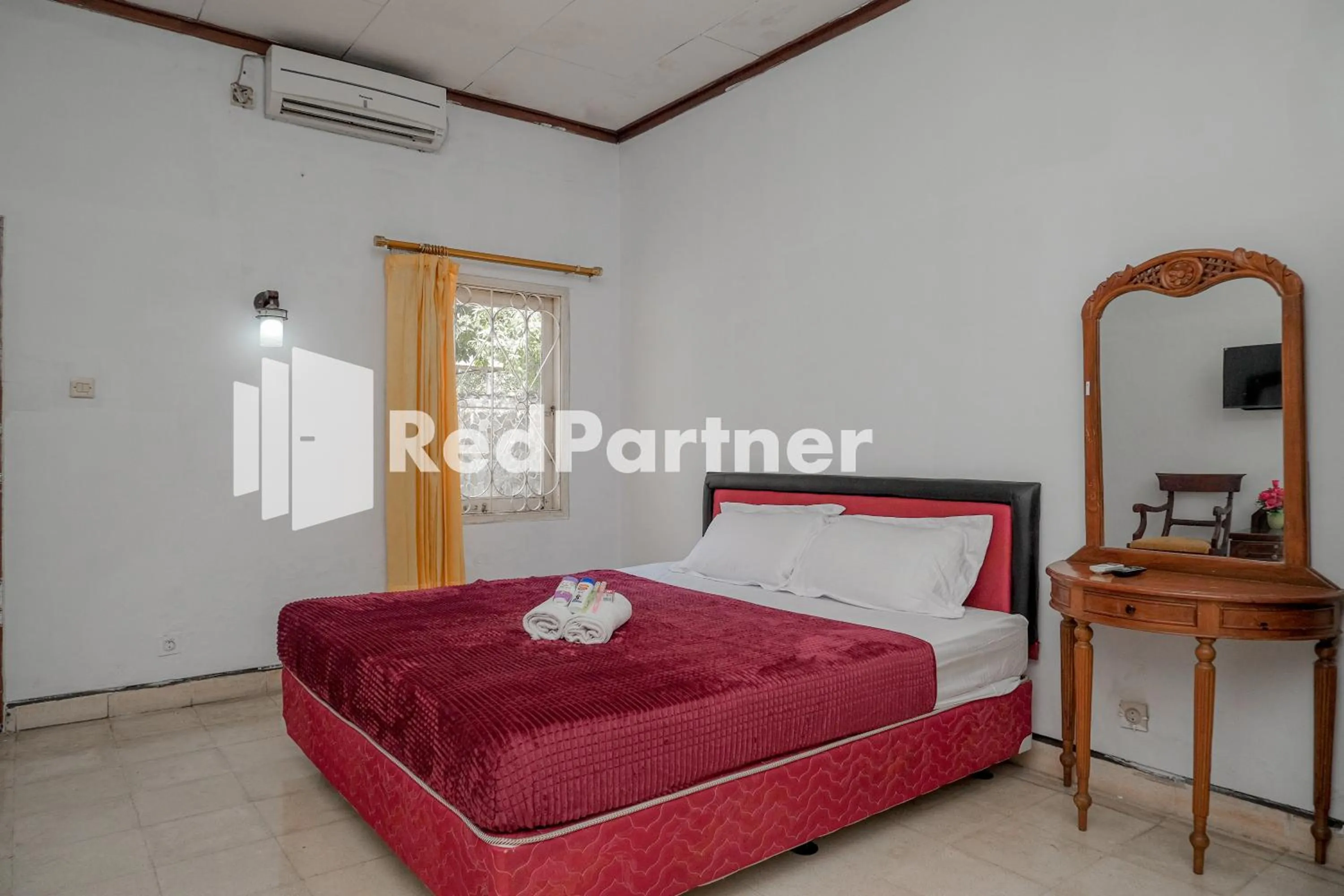 Bedroom in Rajawali Guest House Mitra RedDoorz
