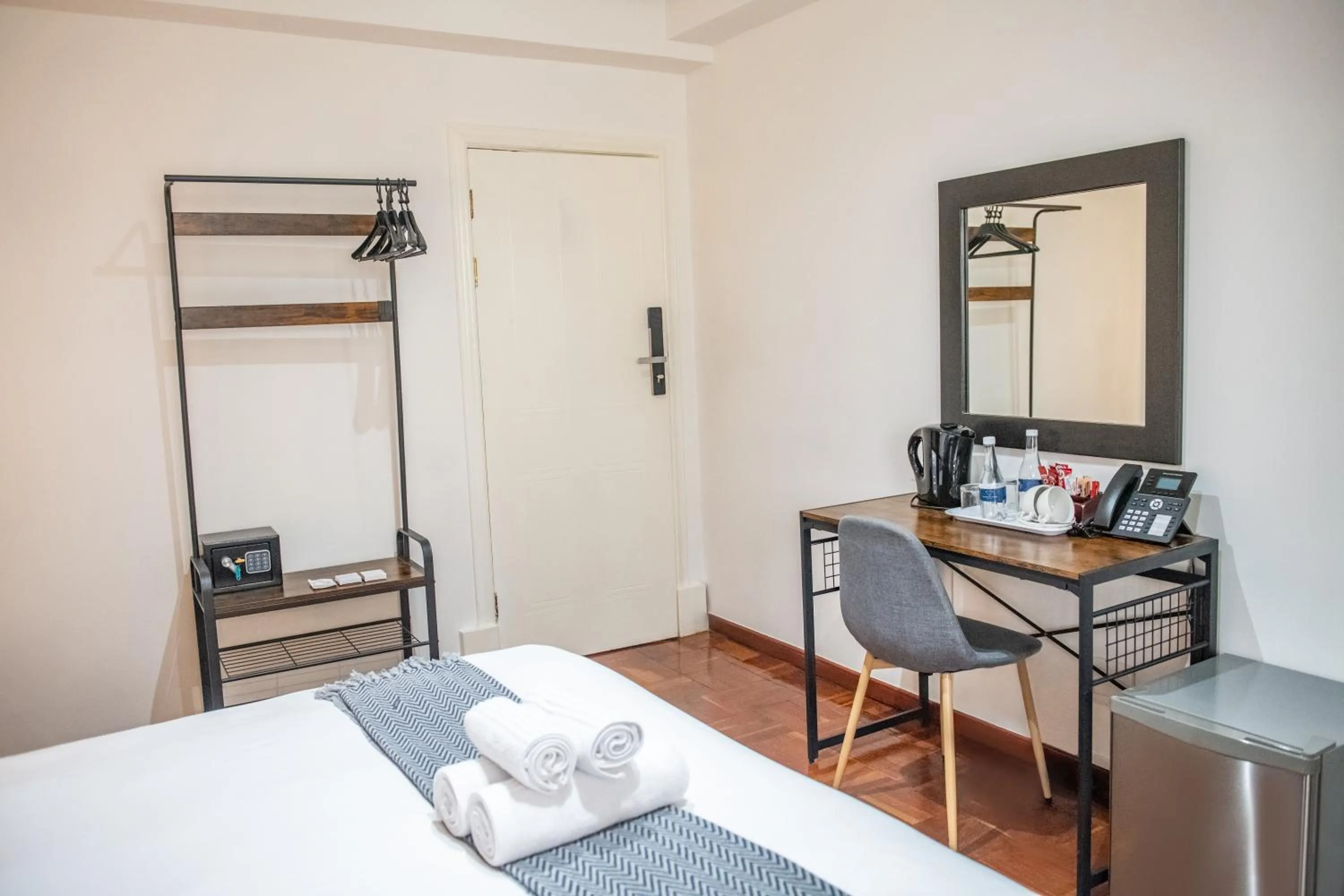 Bed in Cape Diamond Boutique Hotel