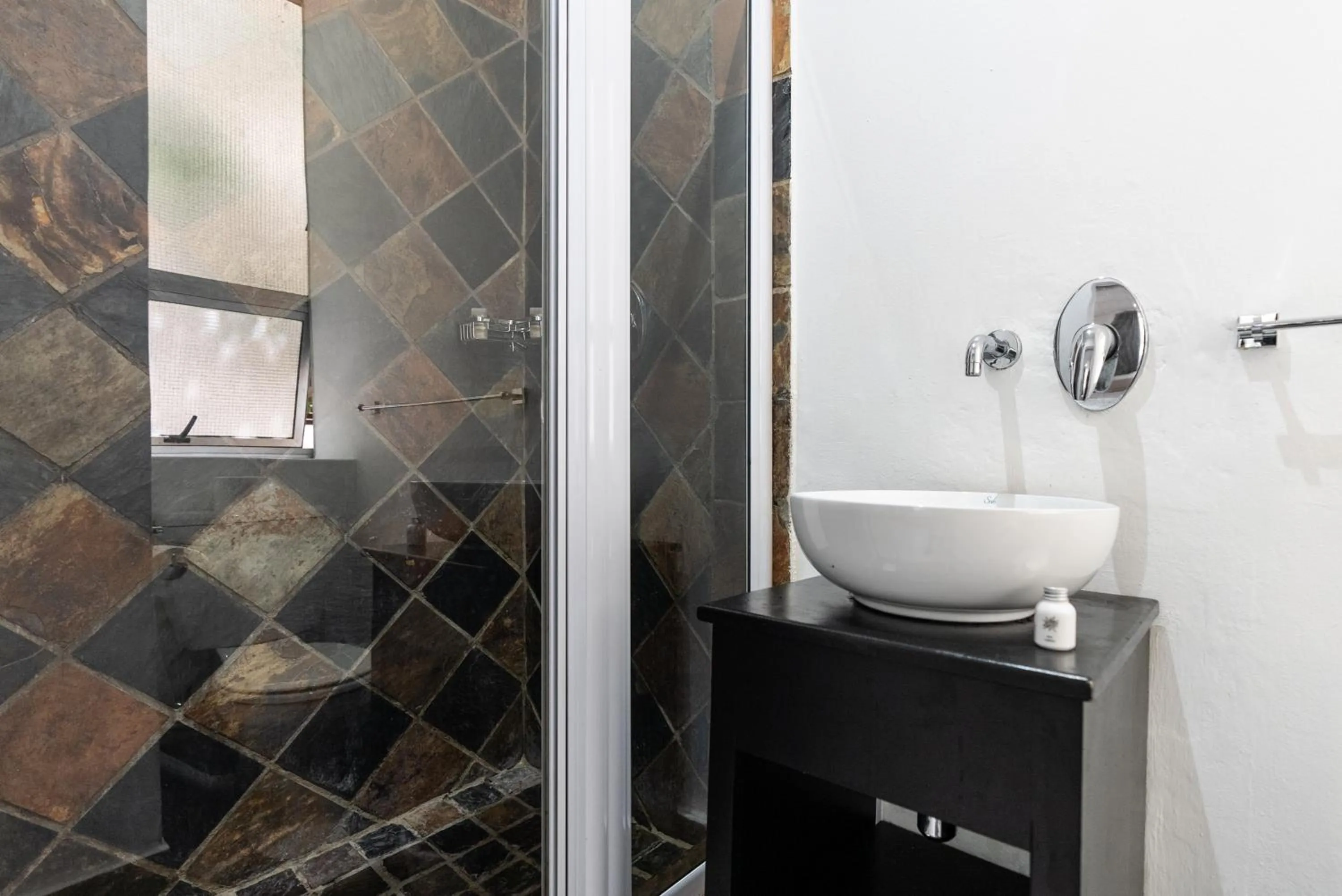 Shower in Cape Diamond Boutique Hotel