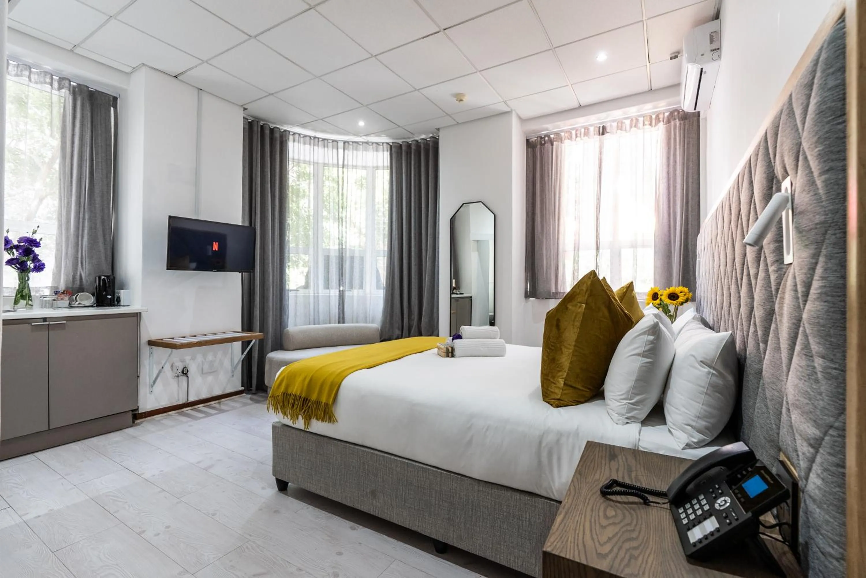 Bed in Cape Diamond Boutique Hotel