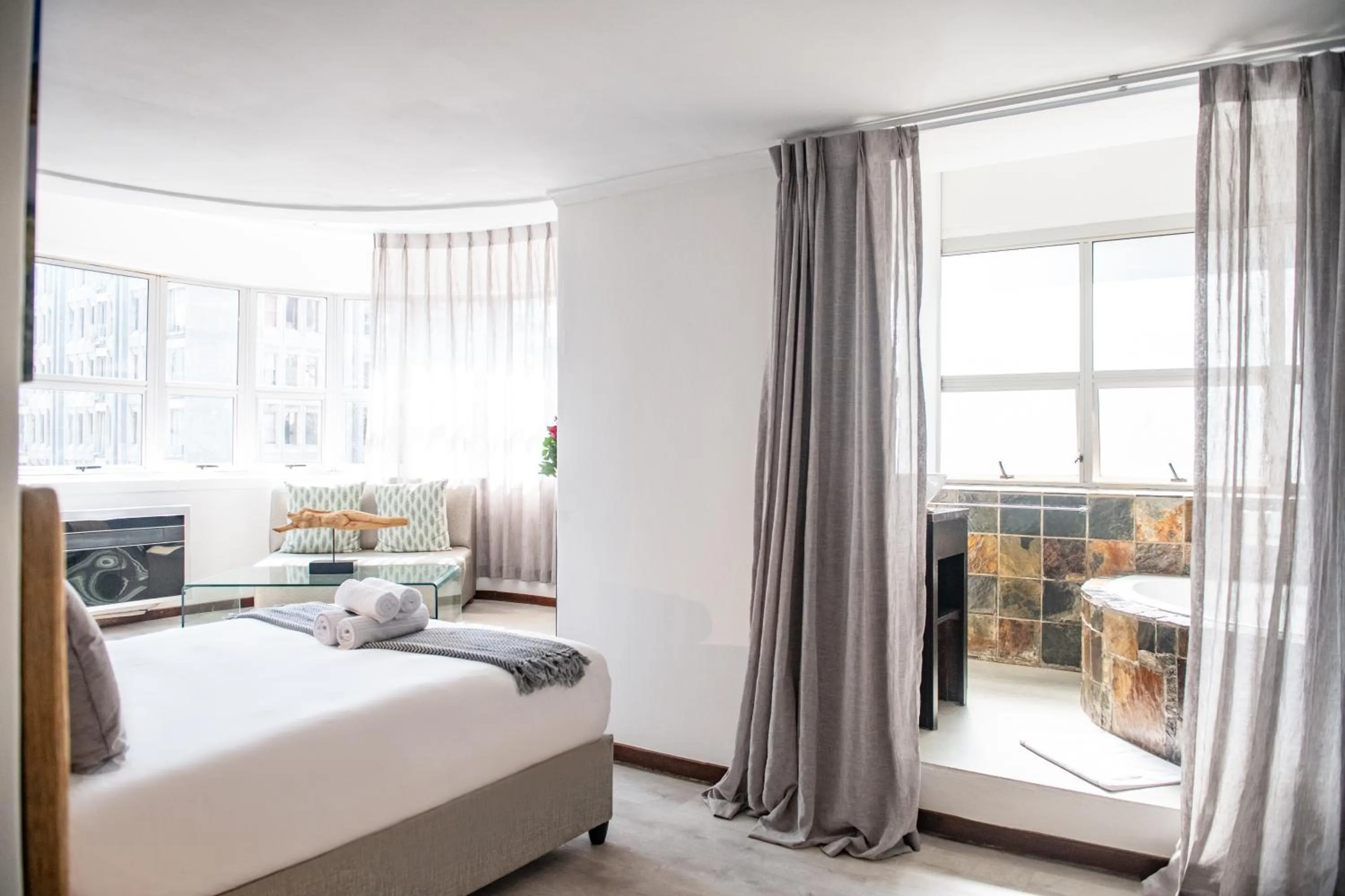 Bed in Cape Diamond Boutique Hotel