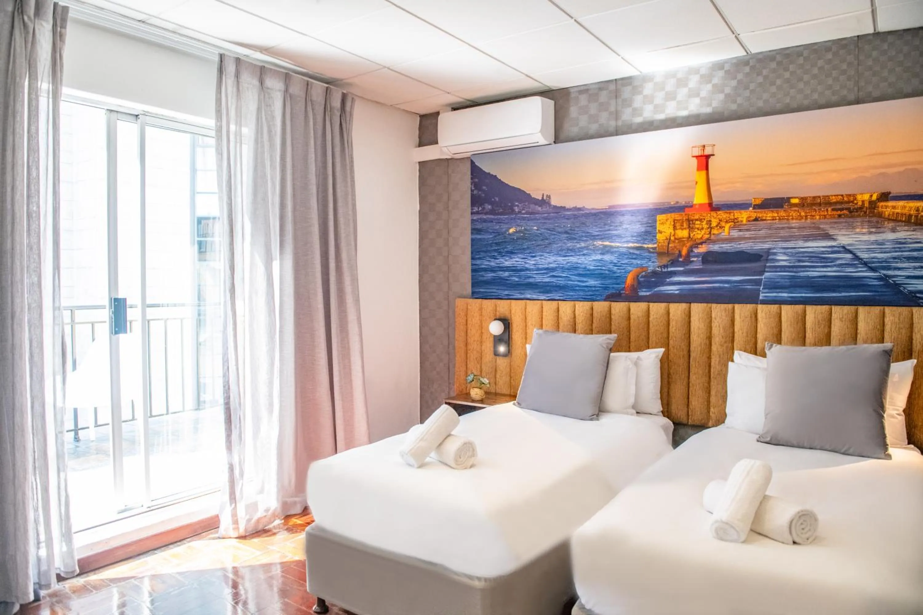 Bed in Cape Diamond Boutique Hotel