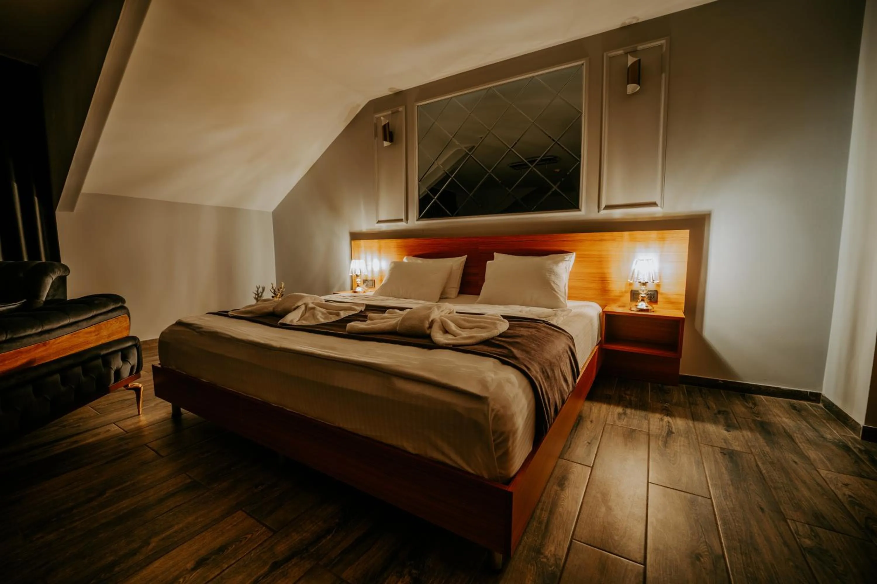 Bed in Grand Quars Hotel