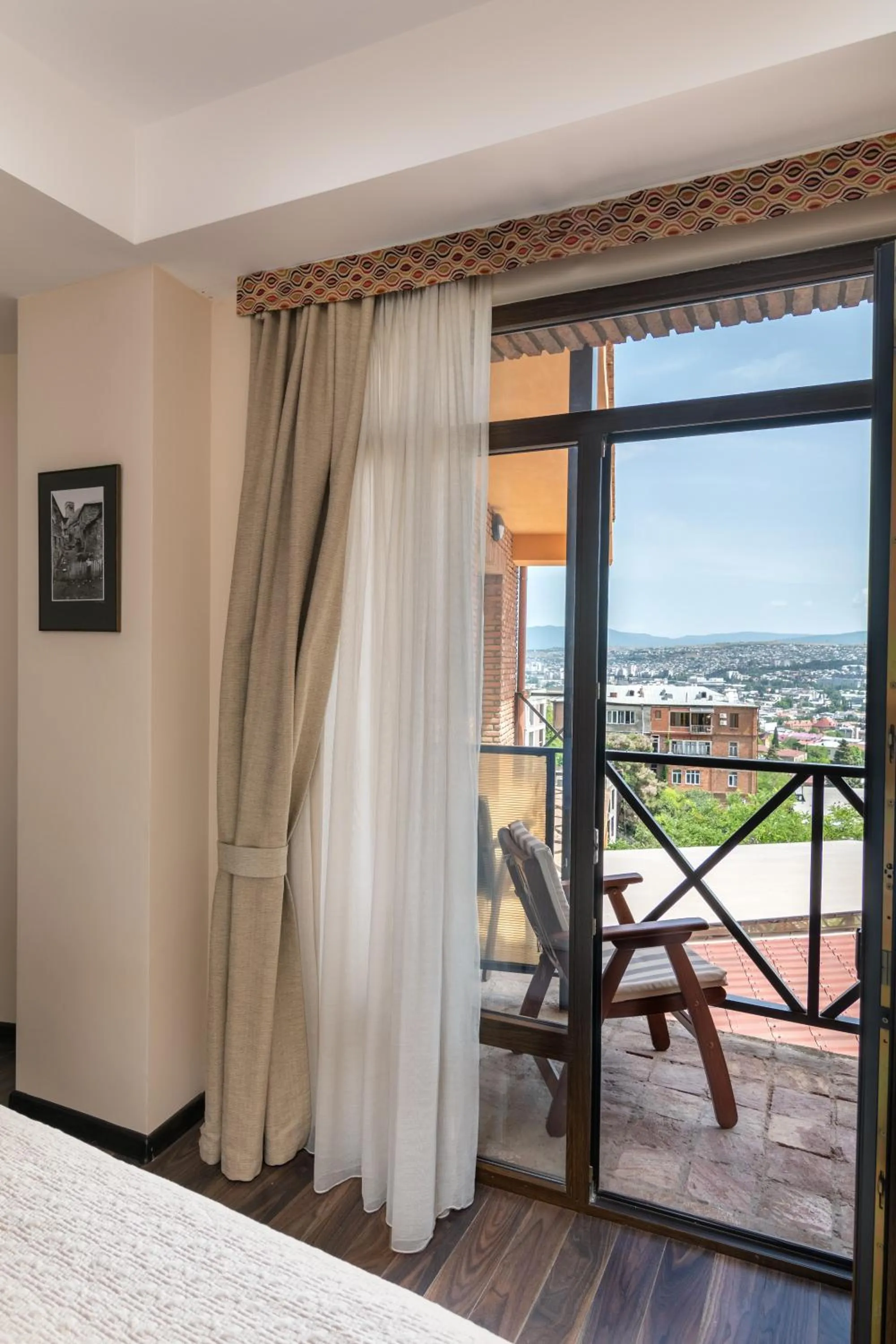 View (from property/room), Bed in GINGER Hotel