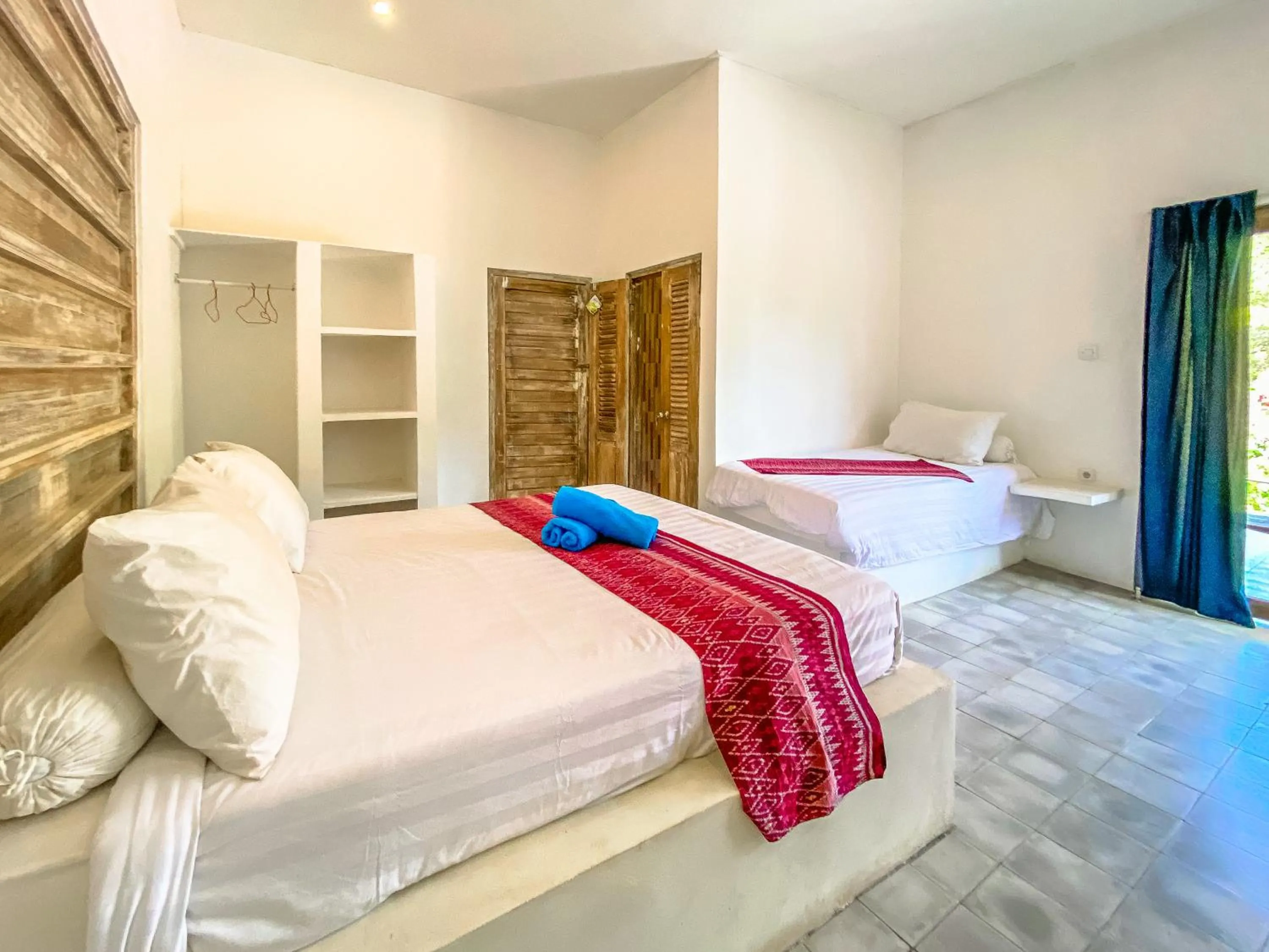 Bed in Namaste Bungalows Resort