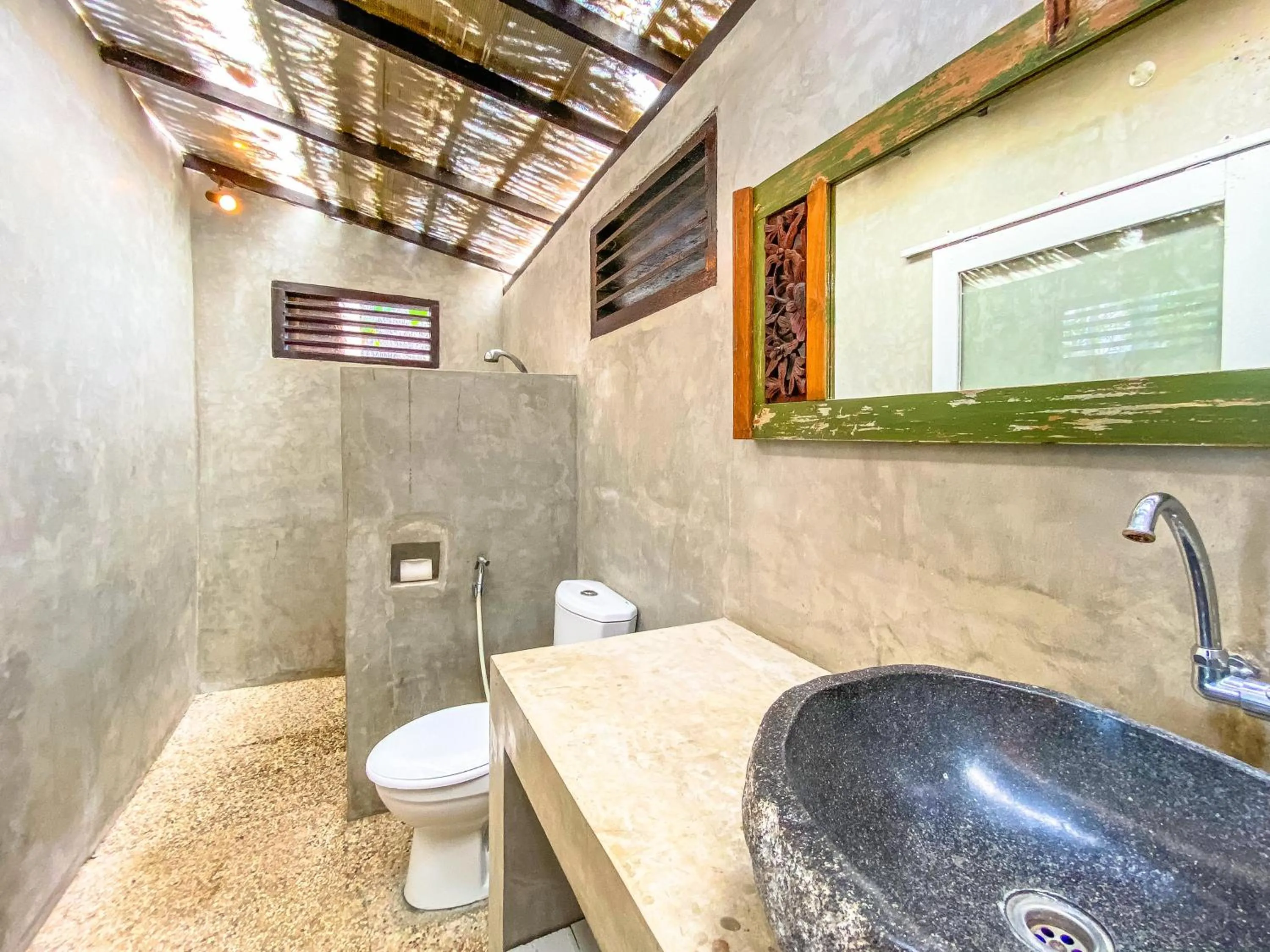Bathroom in Namaste Bungalows Resort