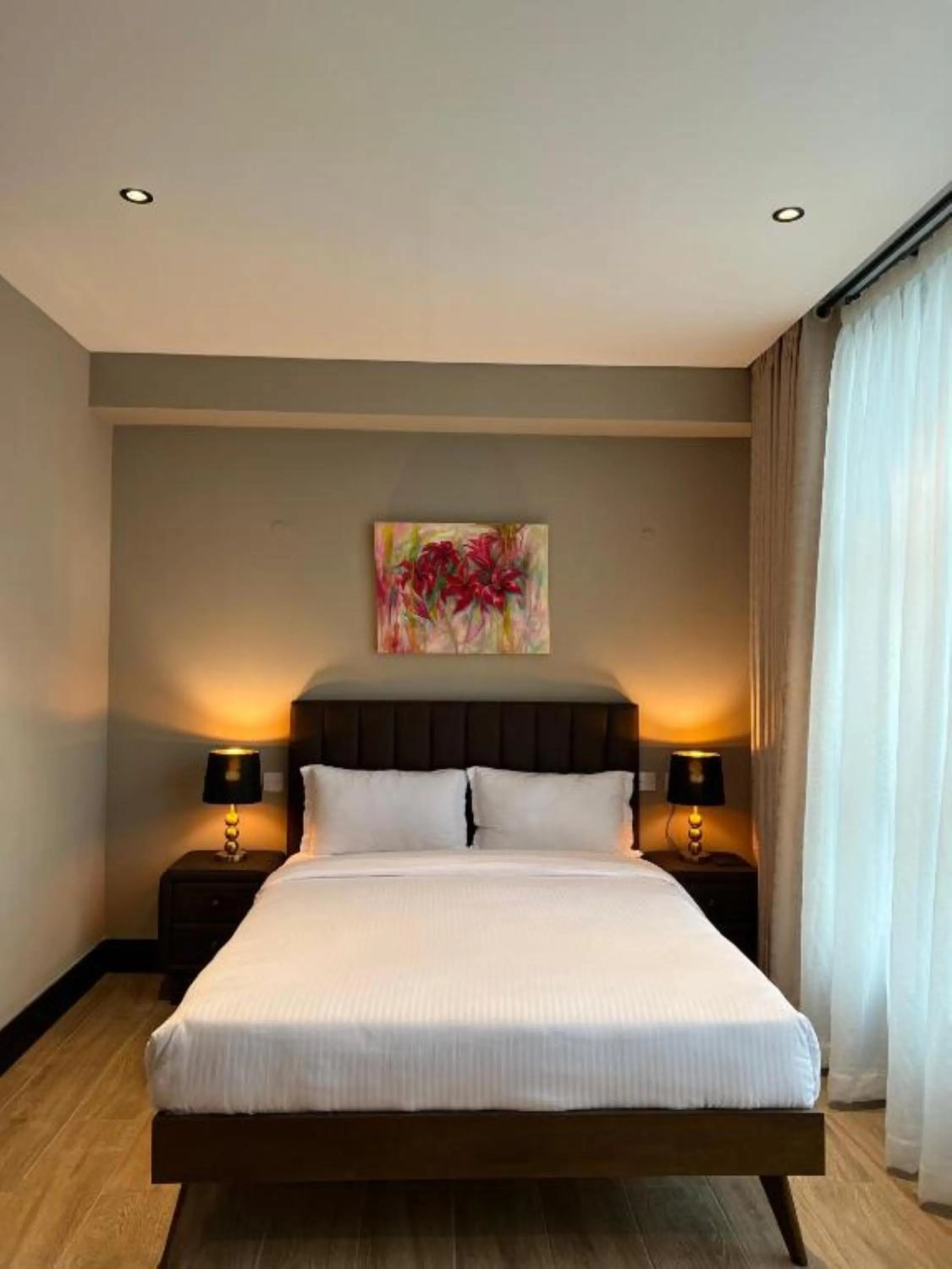 Bed in Sincerely Yours Suites & Serviced Apartments