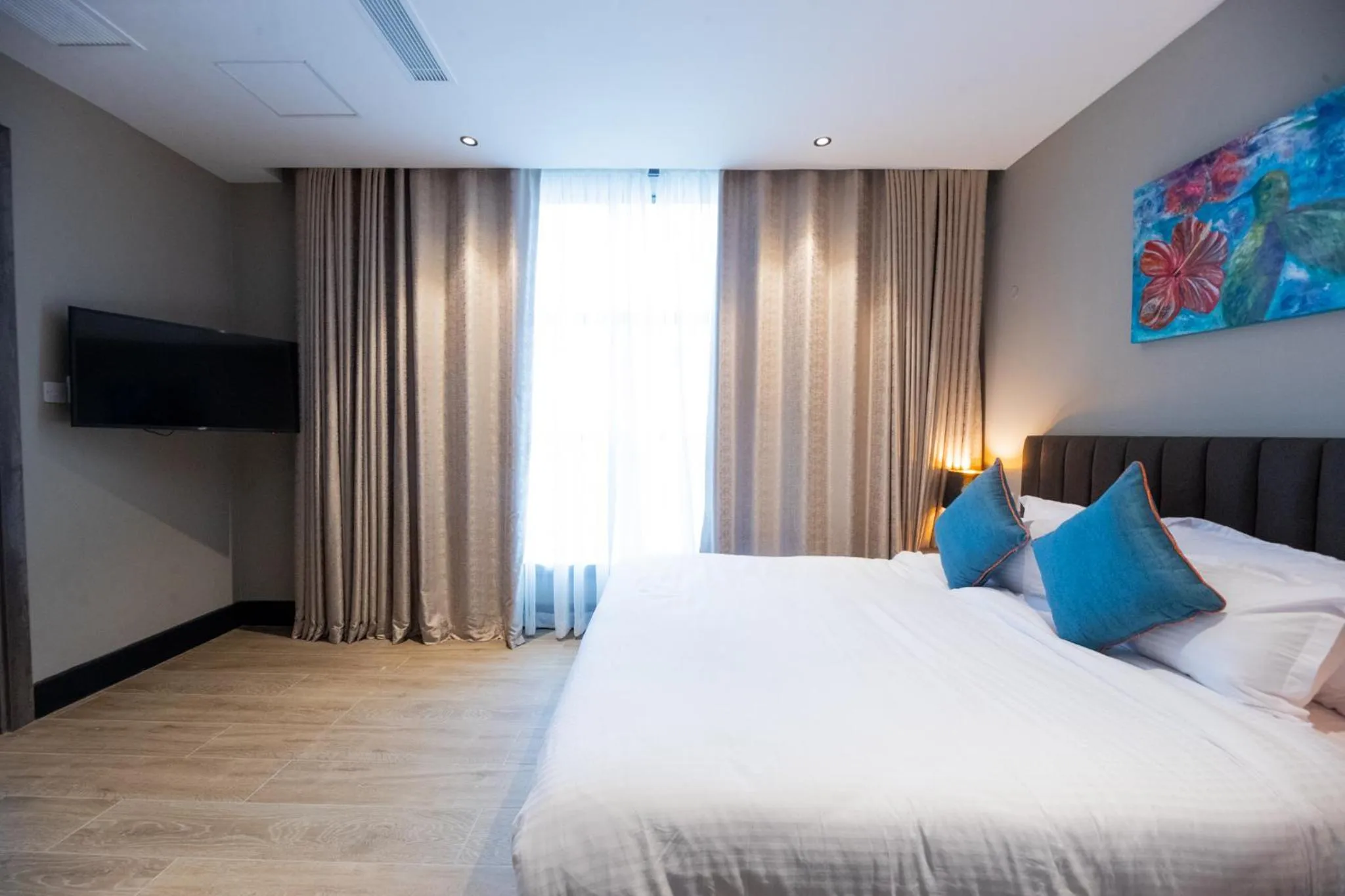 Bed in Sincerely Yours Suites & Serviced Apartments