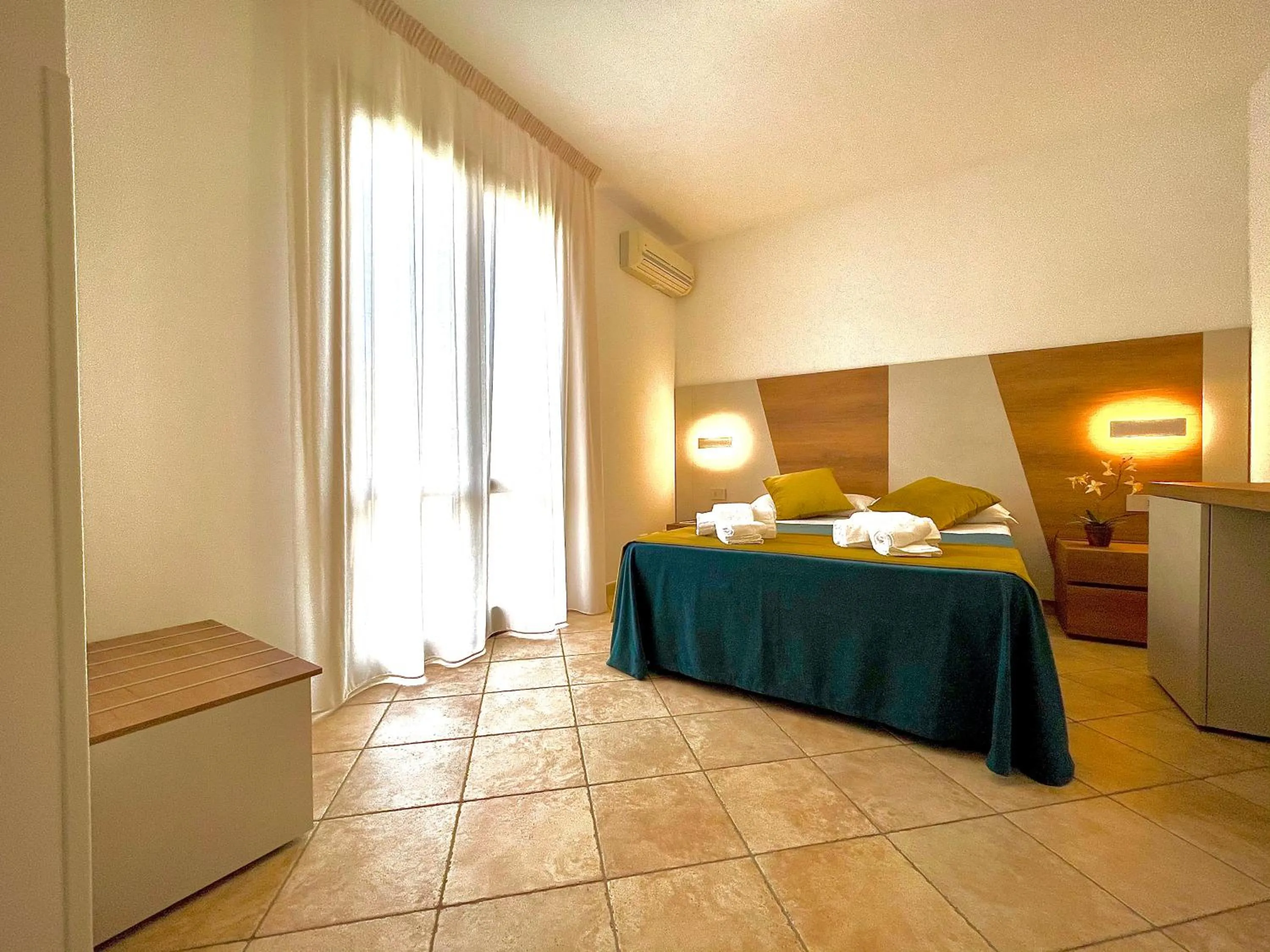 View (from property/room), Bed in Hotel Sikania