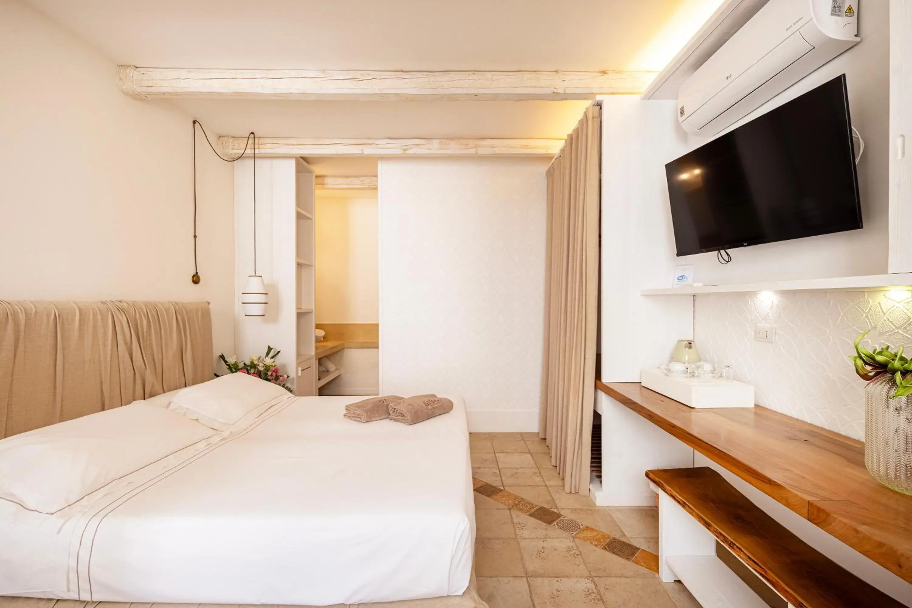 Bed in Masseria Bandino & Spa Bed in Masseria Bandino & Spa